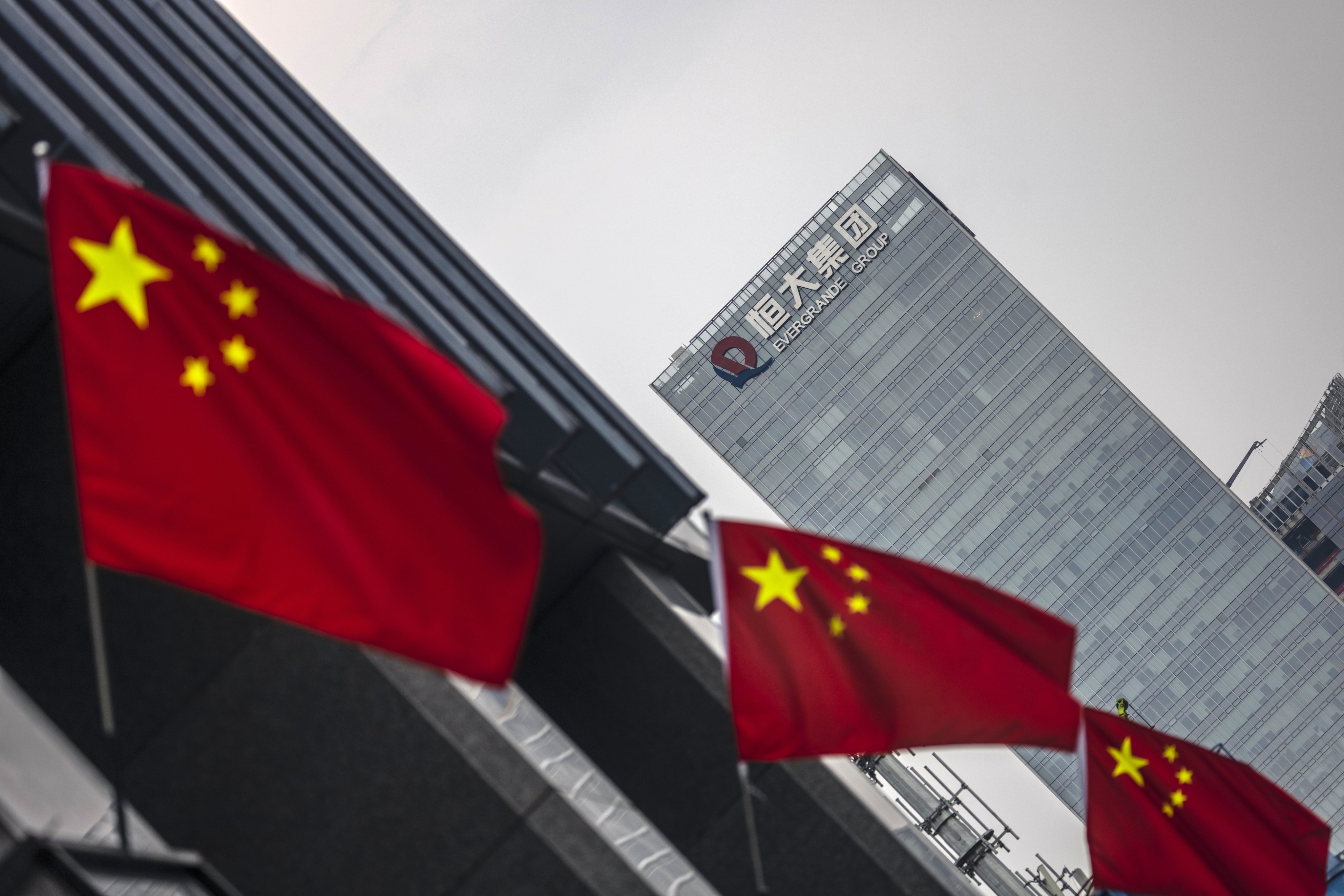 The China Evergrande Group headquarters in Shenzhen. The developer says work has resumed at 10 of its projects in Yunnan province. Photo: EPA-EFE