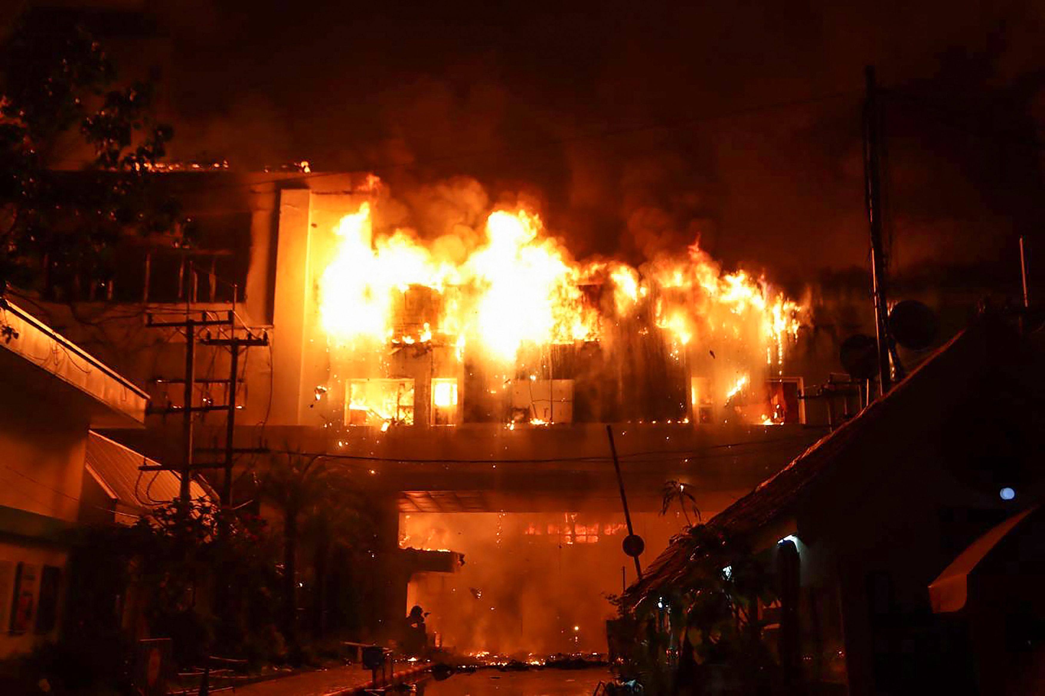 A major fire burns through the Grand Diamond City hotel-casino in Poipet. Photo: AFP 