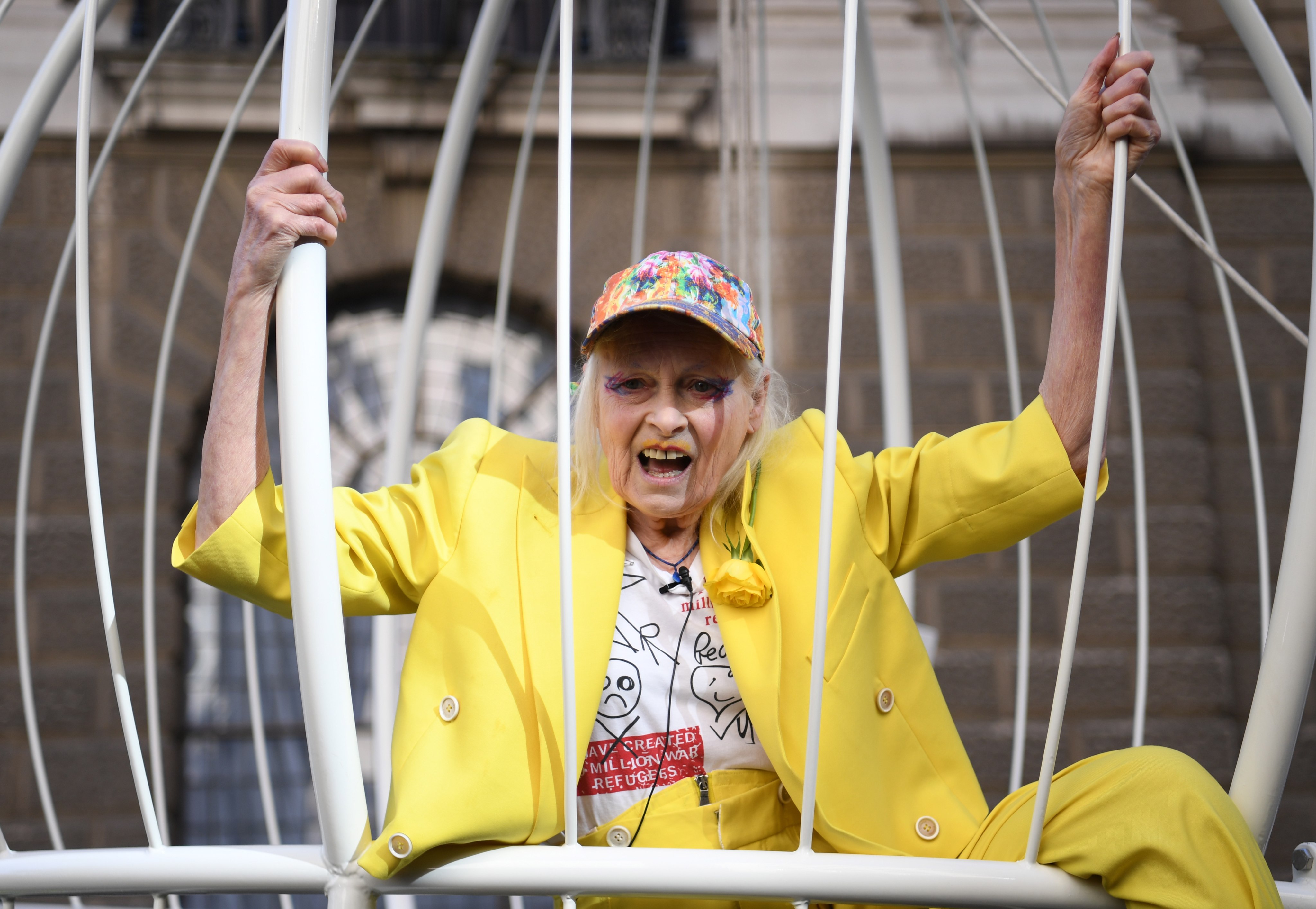 Vivienne Westwood’s activism extended to supporting Wikileaks founder Julian Assange, posing in a giant birdcage in 2020 to try to halt his extradition to the US. File photo: EPA-EFE