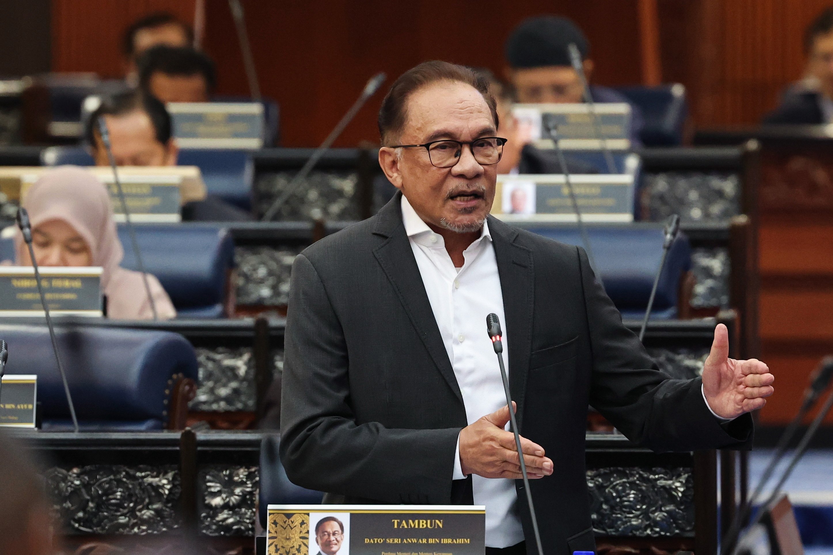 Malaysian Prime Minister Anwar Ibrahim speaks during a plenary session of parliament on December 20. Photo: DPA