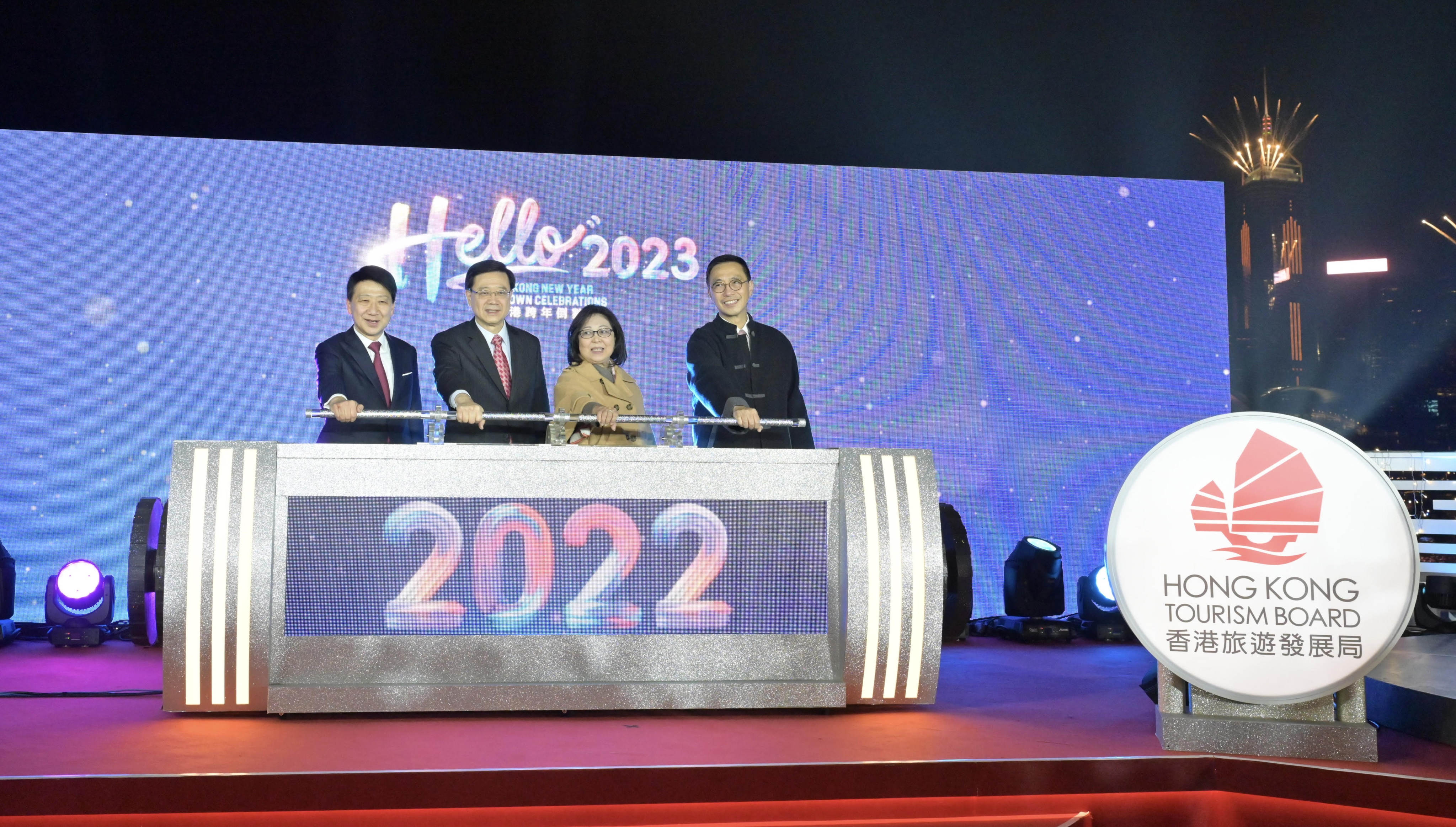 John Lee and his wife (centre) at a countdown celebration on Saturday night. Photo: Handout