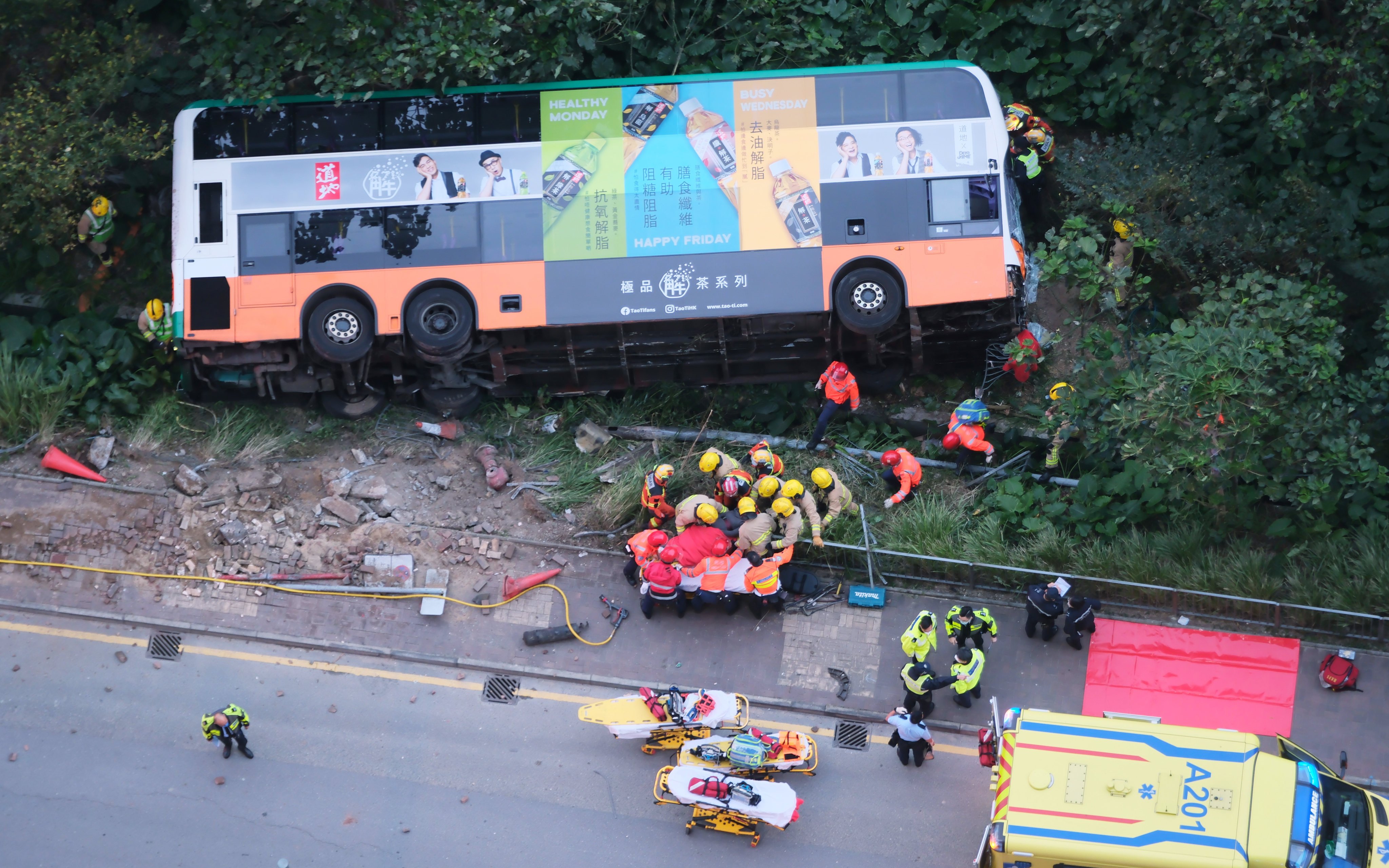 More than 30 passengers were injured after a bus overturned in Tseung Kwan O on New Year’s Day. Photo: Sun Yeung