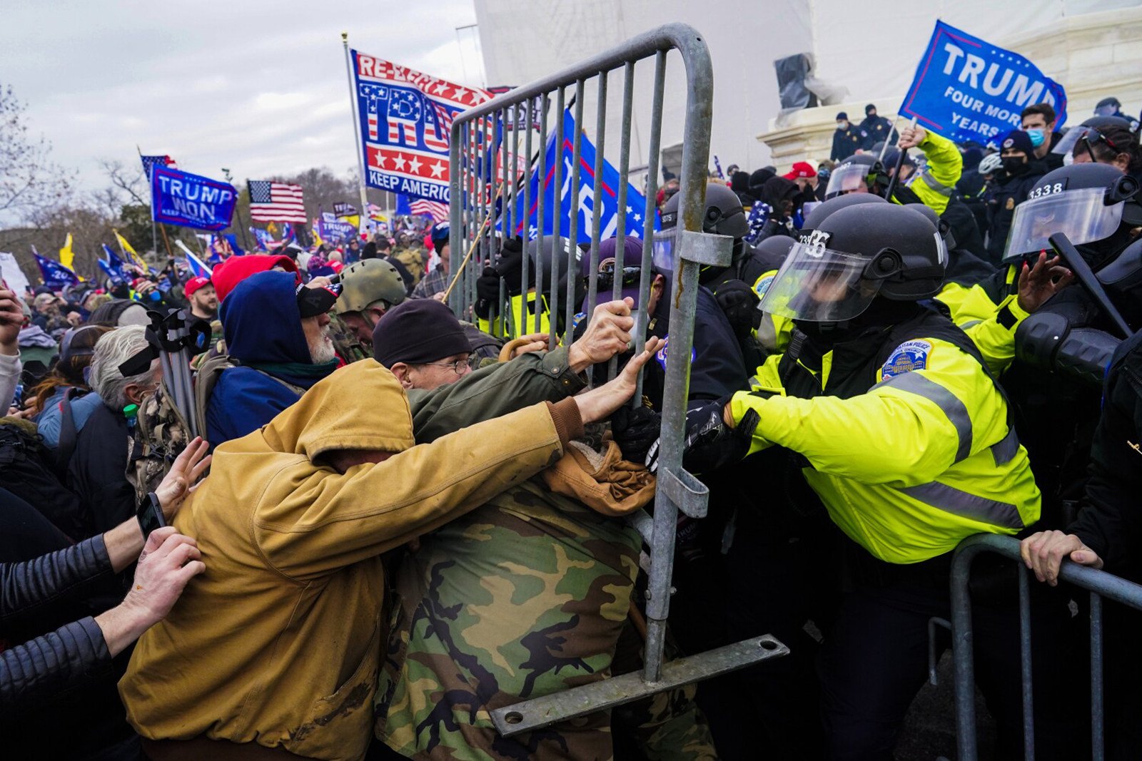 Trump supporters push against barricades on January 6, 2021, at the US Capitol in Washington. Photo: TNS