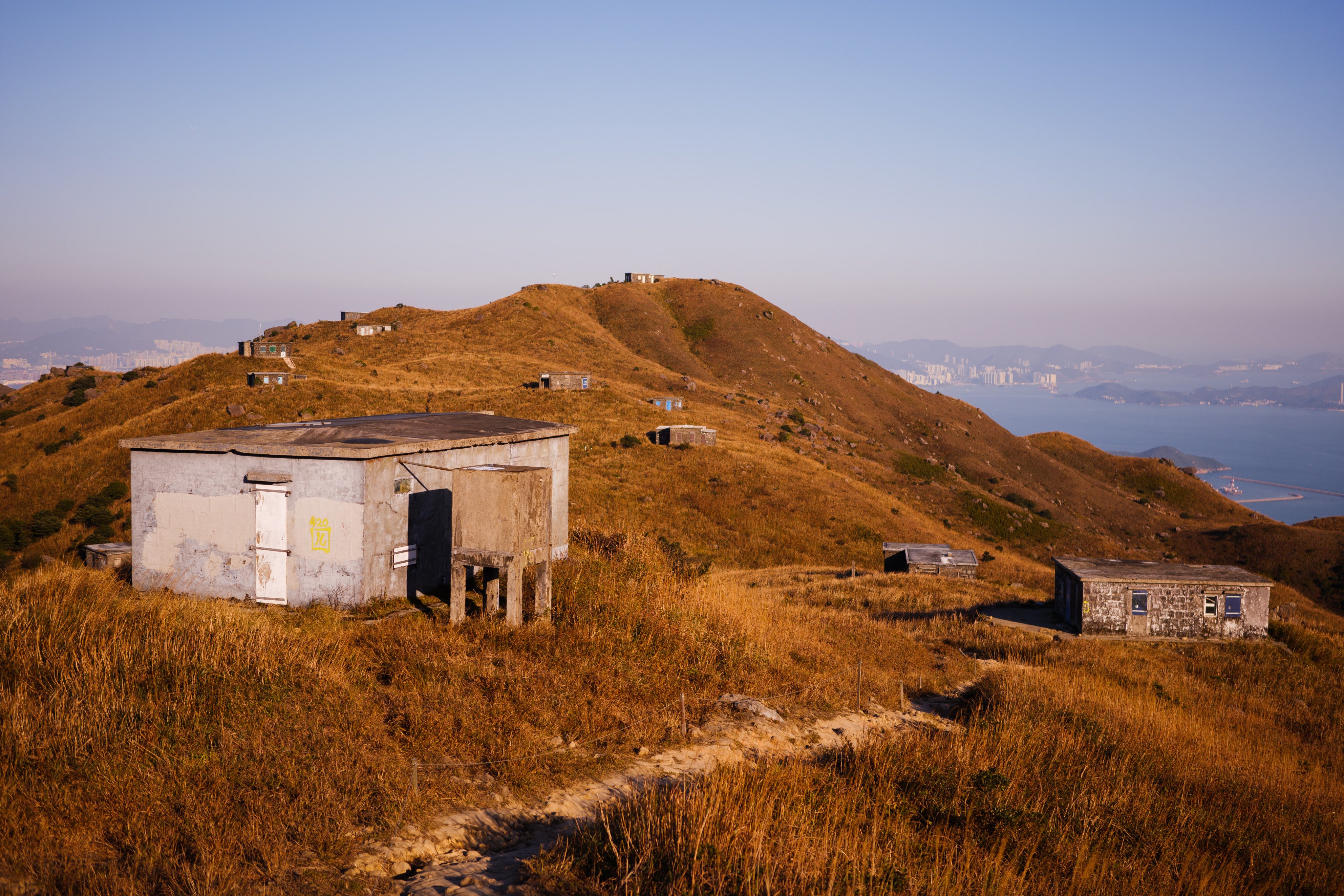 Nineteen spartan stone cabins form the Lantau Mountain Camp, which dots the ridge between Sunset Peak and Yi Tung Shan. Photo: Daniel Suen