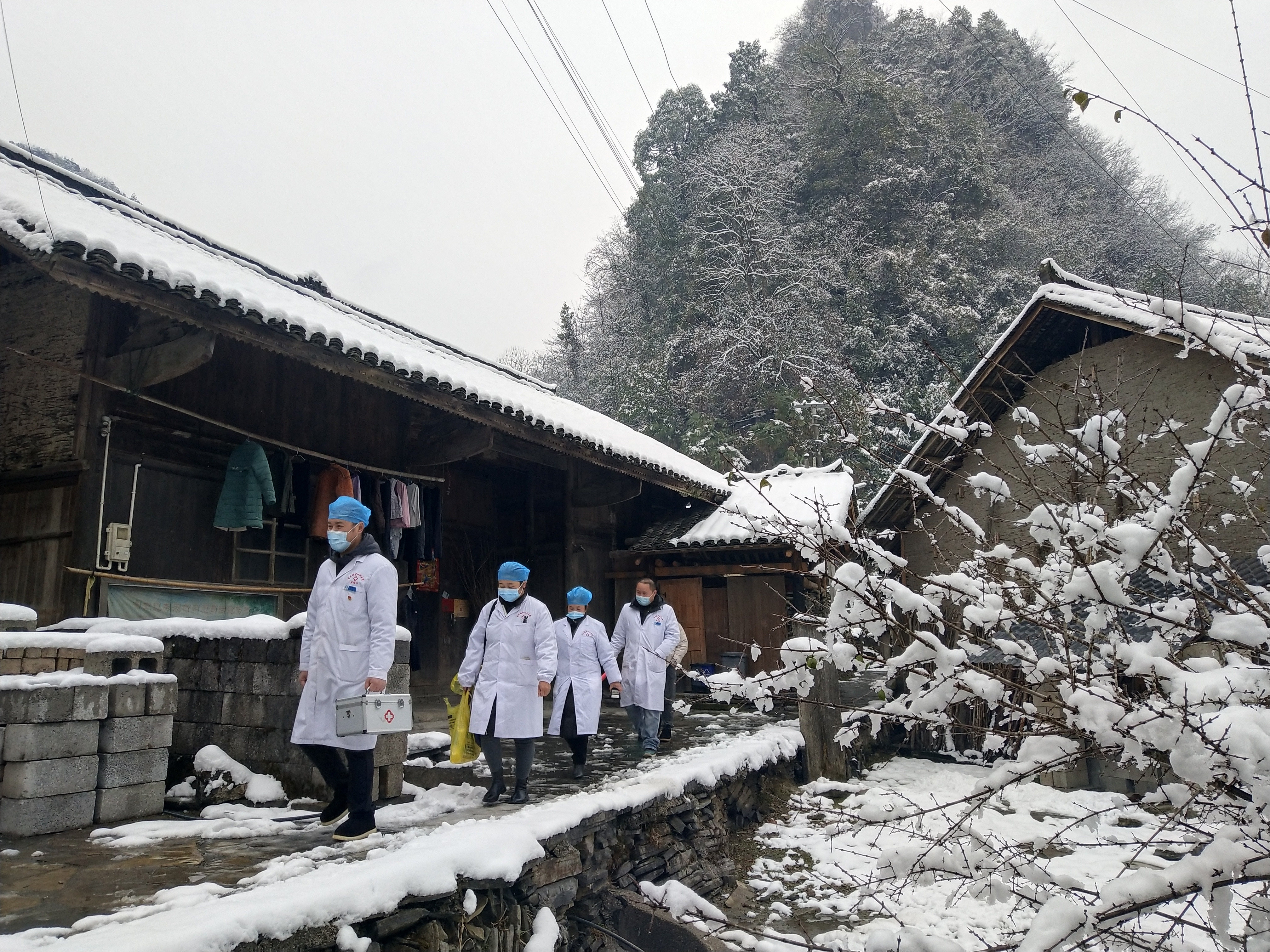 Rural doctors visit households to provide medical support in central China’s Hunan Province. Photo: Xinhua