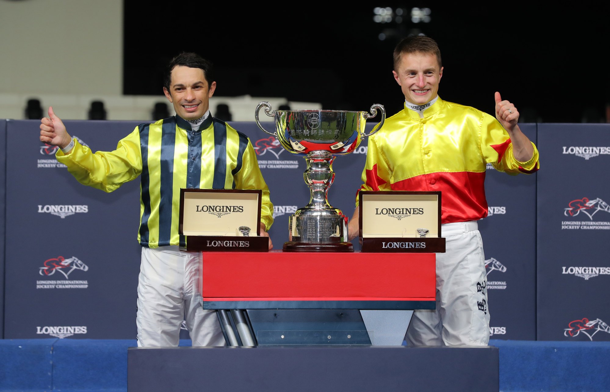 Silvestre de Sousa (left) and Tom Marquand (right) celebrate their International Jockeys’ Championship tie.