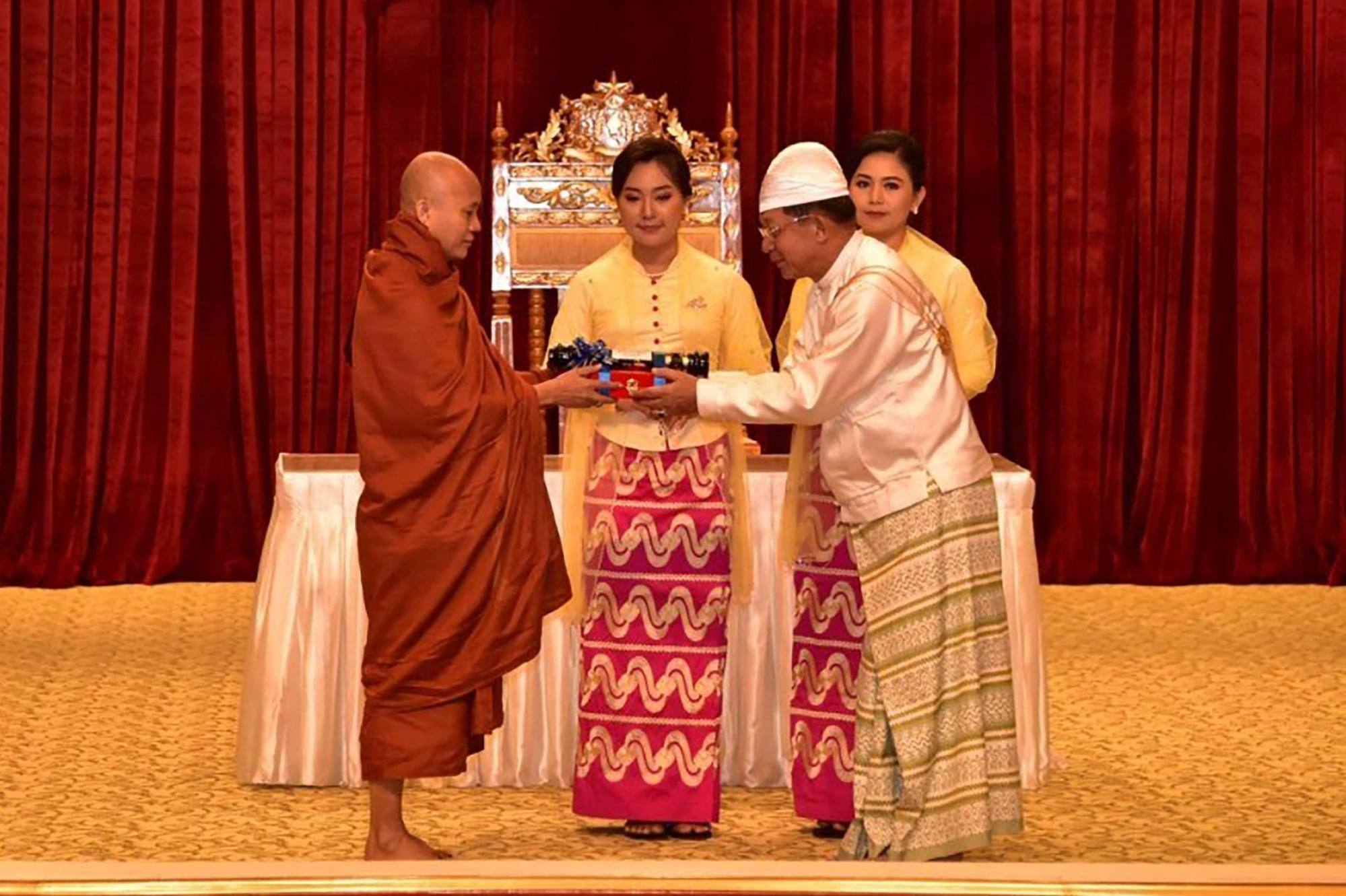Wirathu (left) is presented with an award for “outstanding work for the good of the Union of Myanmar” by junta chief Min Aung Hlaing (right) at a ceremony in Naypyidaw. Photo: Myanmar Military Information Team Handout via AFP