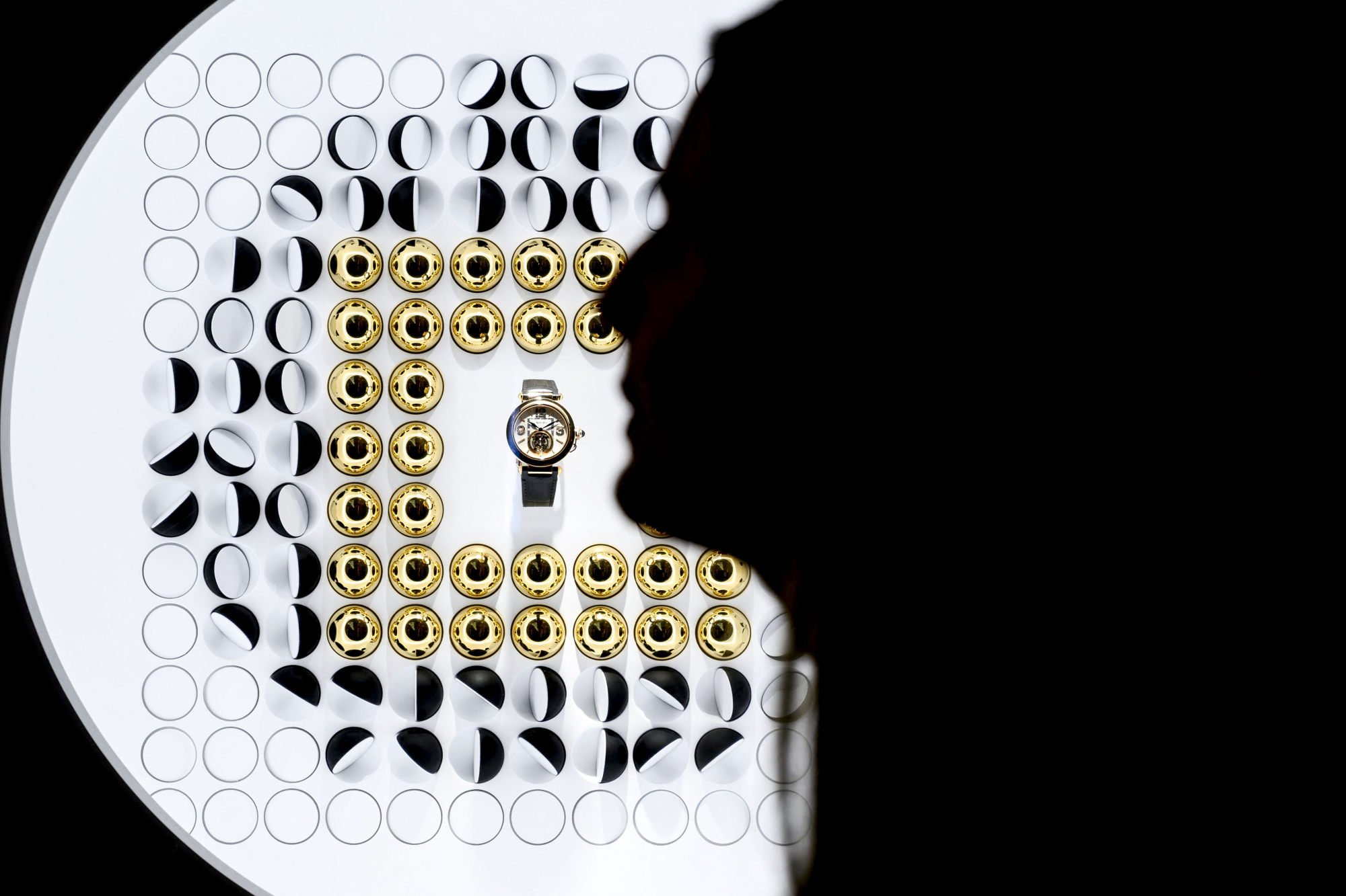 The Cartier stand at the 2022 Watches & Wonders Geneva show advertises the brand’s latest women’s lines. Photo: AFP