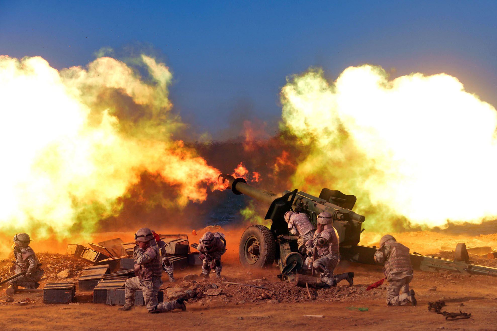 North Korean soldiers fire long-range artillery pieces during a military exercise held in an unknown location last year, in a picture provided by the North Korean state news agency. Photo: KCNA/KNS/dpa