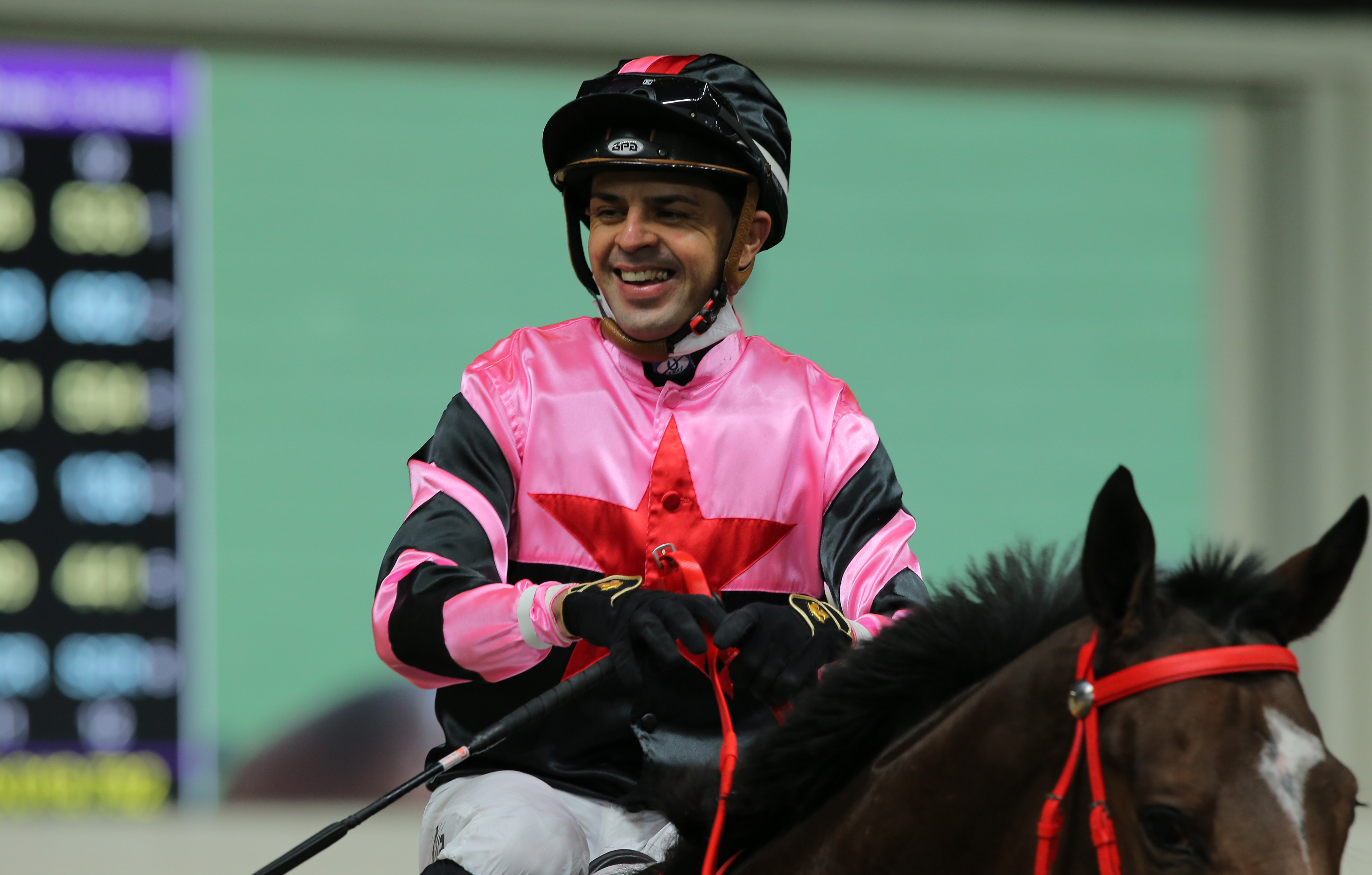 Ruan Maia celebrates snapping his 70-ride losing run with a victory aboard Top Top Tea at Happy Valley on Wednesday night. Photo: Kenneth Chan