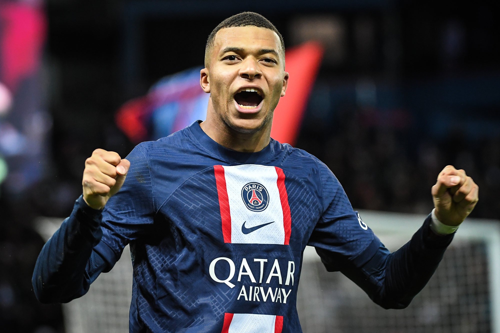 Paris Saint-Germain’s Kylian Mbappé celebrates scoring his side’s second goal during the French Ligue 1 football match between Paris Saint-Germain (PSG) and Racing Club de Strasbourg at Parc des Princes Stadium in December 2022. Photo: dpa