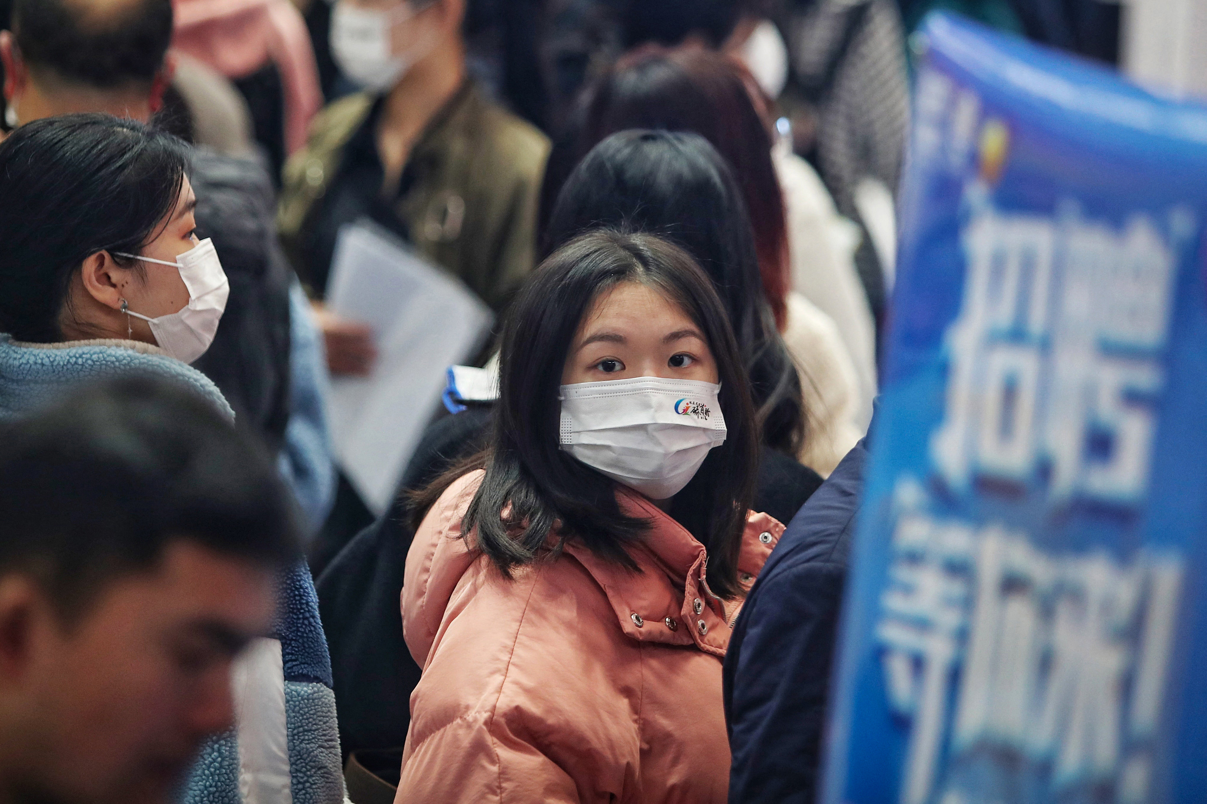 Young Chinese adults, many of whom are fresh graduates, attend a job fair in Wuhan, Hubei province. Photo: AFP