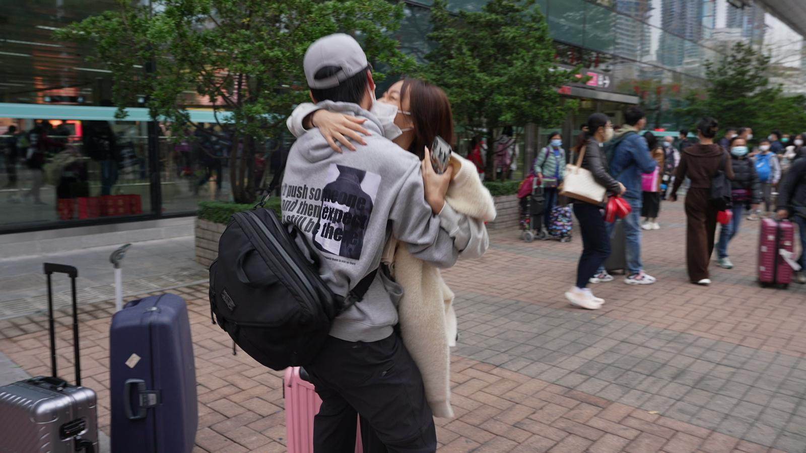 Engineer Zhou Yuhang and his girlfriend Karin Xu meet for the first time in six months. Photo: Handout