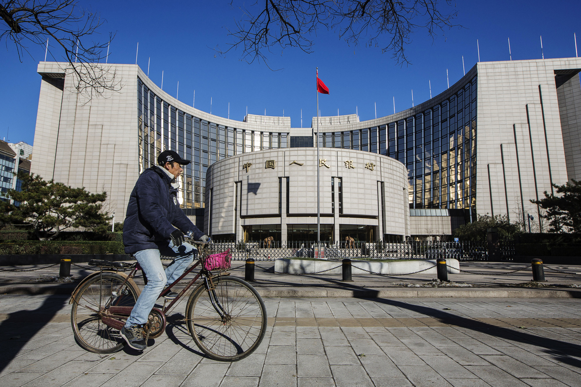 The People’s Bank of China headquarters in Beijing. China plans to expand its climate stress testing of the financial sector to other heavy-emitting industries, the governor of the Chinese central bank says. Photo: Bloomberg