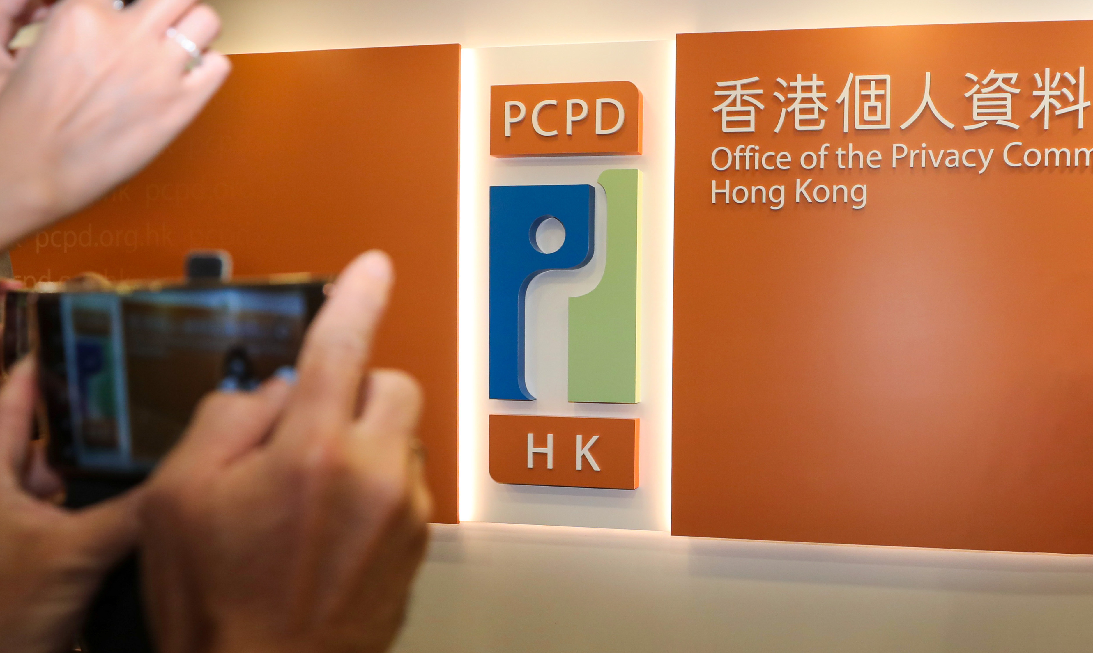 The Office of the Privacy Commissioner arrested a former school worker for allegedly doxxing her ex-colleague. Photo: Xiaomei Chen