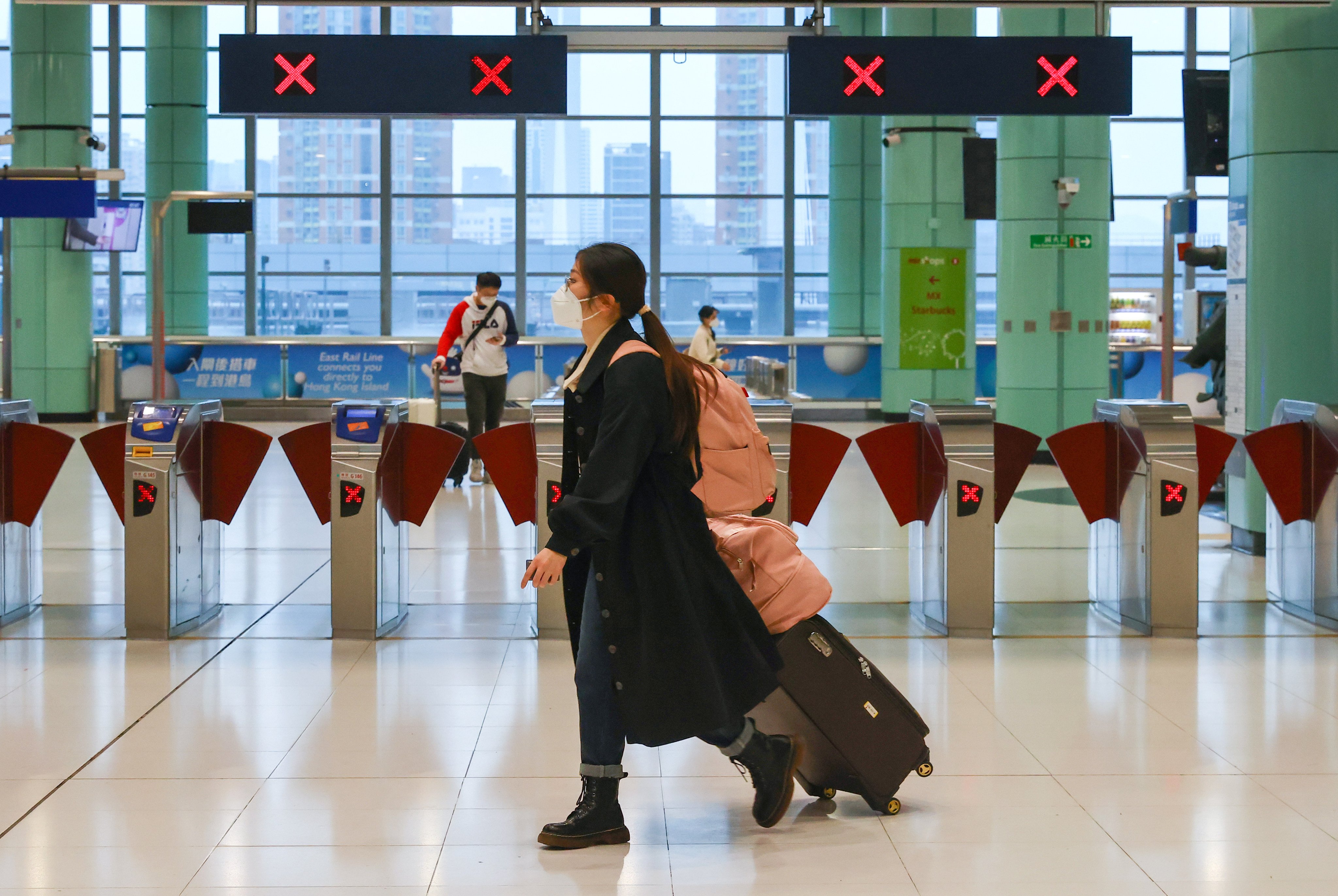 A traveller walks through Hong Kong’s Lok Ma Chau station on January 9, the first day of the Hong Kong-mainland China border reopening. Photo: Dickson Lee