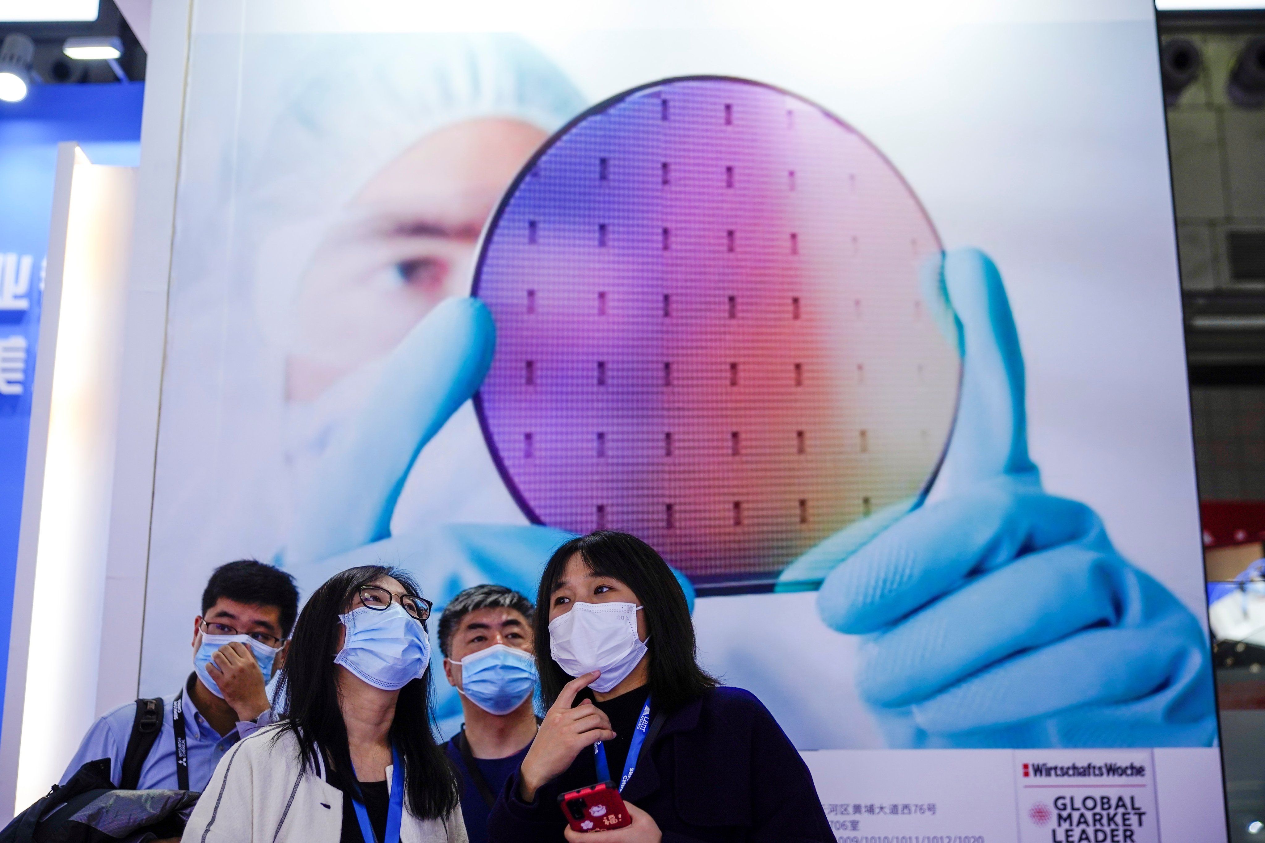People visit a display at Semicon China, a trade fair for semiconductor technology, in Shanghai on March 17, 2021. Photo: Reuters