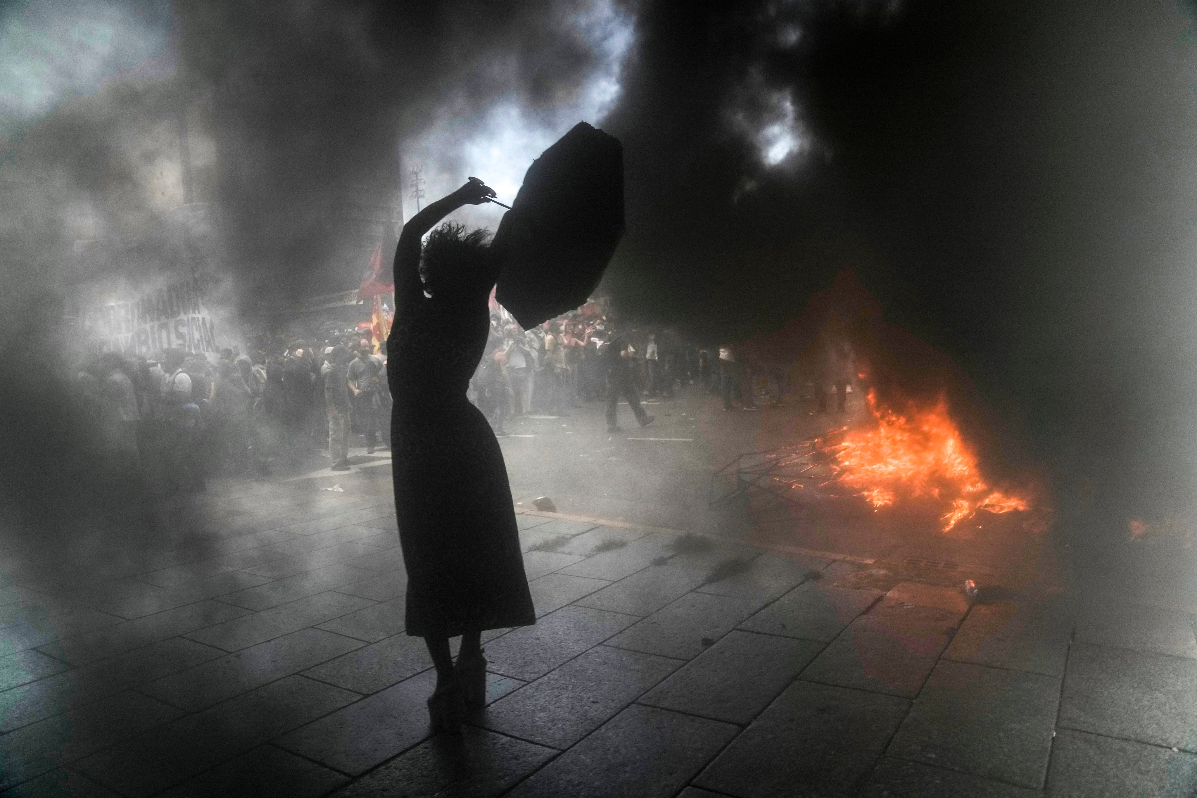 A woman shouts anti-government slogans during a protest in Buenos Aires, Argentina, against the government’s agreement with the International Monetary Fund to refinance some US$45 billion in debt, on March 10, 2022. Photo: AP 