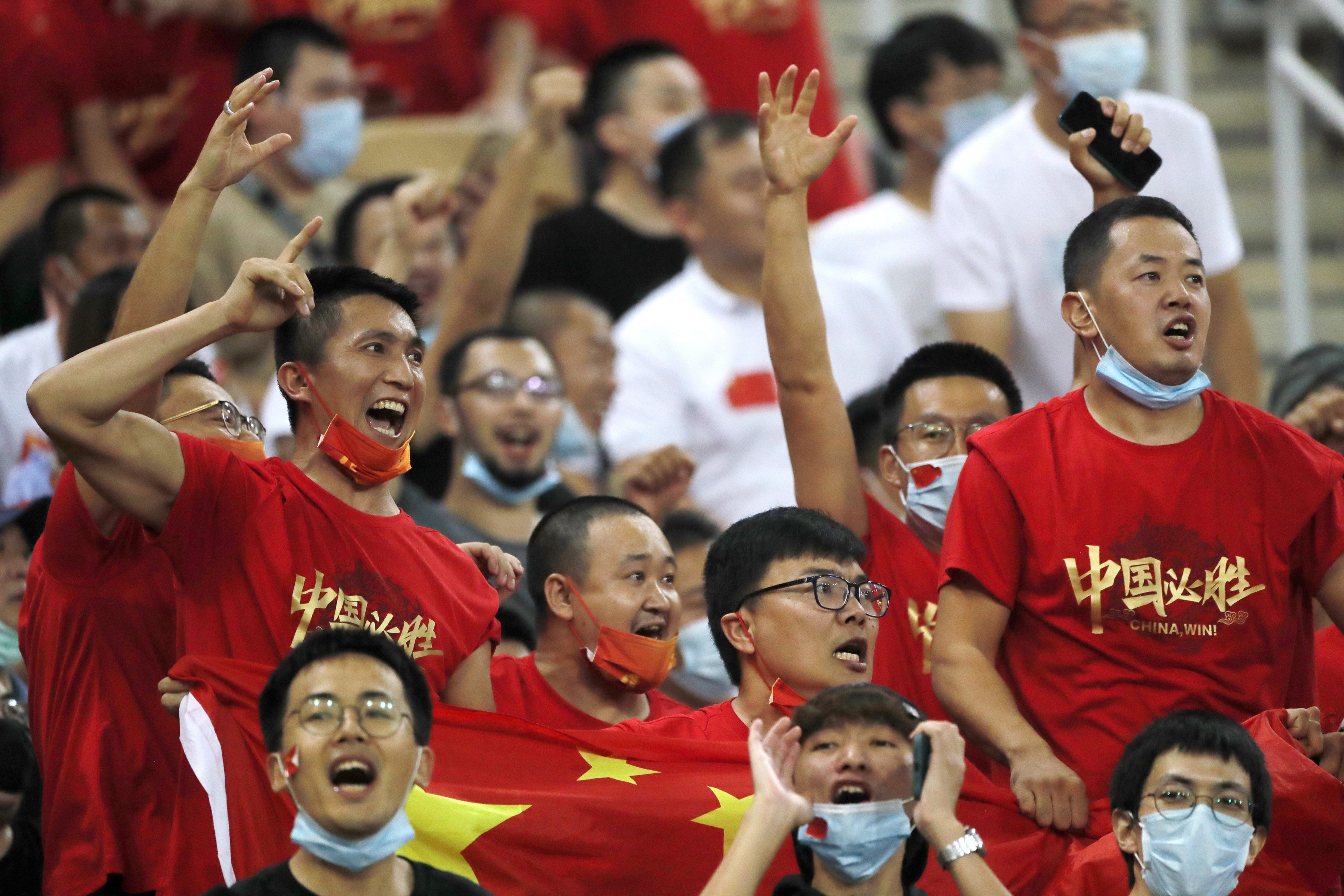 After three years of isolation and financial struggles in Chinese football the country is reopening its borders and economy to the outside world. Photo: AP