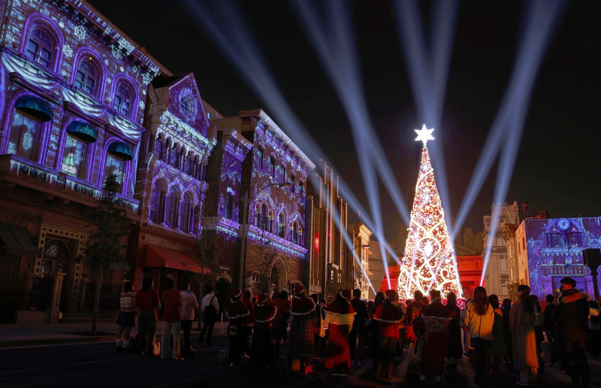A 30-metre-high Christmas tree is unveiled at Universal Studios Japan in Osaka on November 10, 2022. It is one of six Universal Studios theme parks worldwide and was the first to open outside the United States. Photo: Kyodo