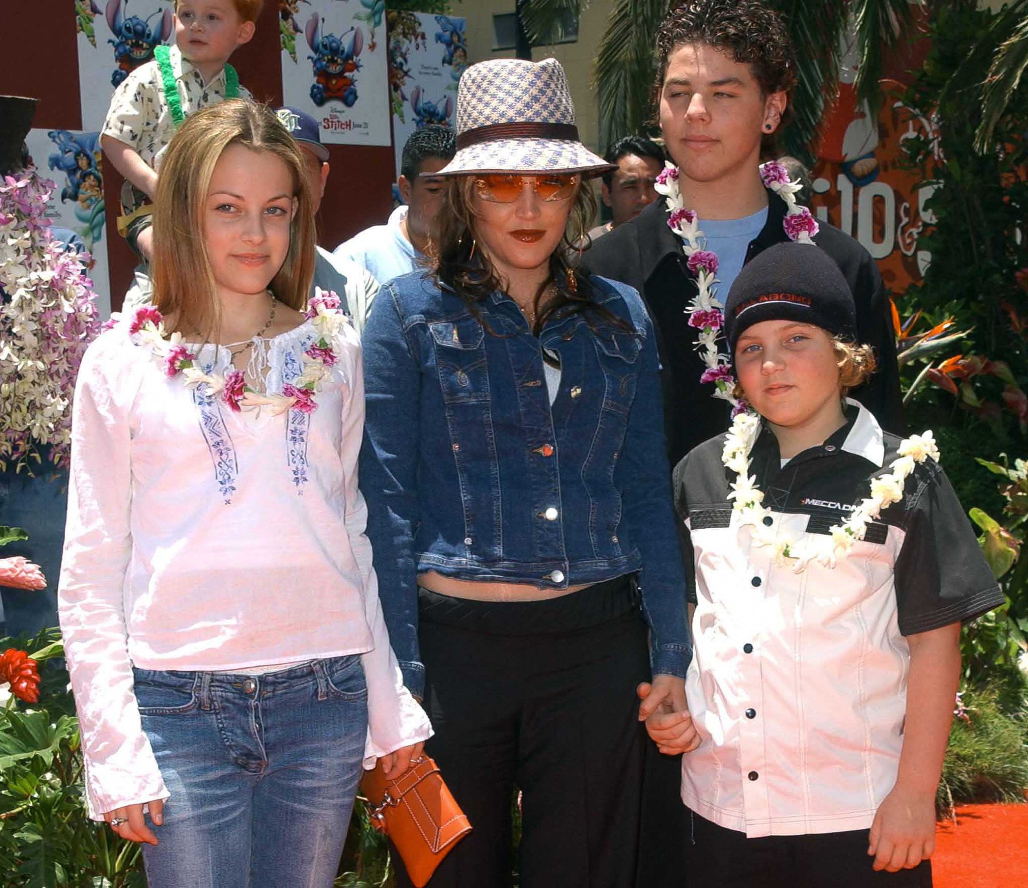 Lisa Marie Presley and her children Benjamin Keough (right), Riley Keough (left) and her half-brother Navarone Garibaldi (back) attend the premiere of Lilo and Stitch at the El Capitan theatre in Hollywood, US, in 2002. Photo: AFP