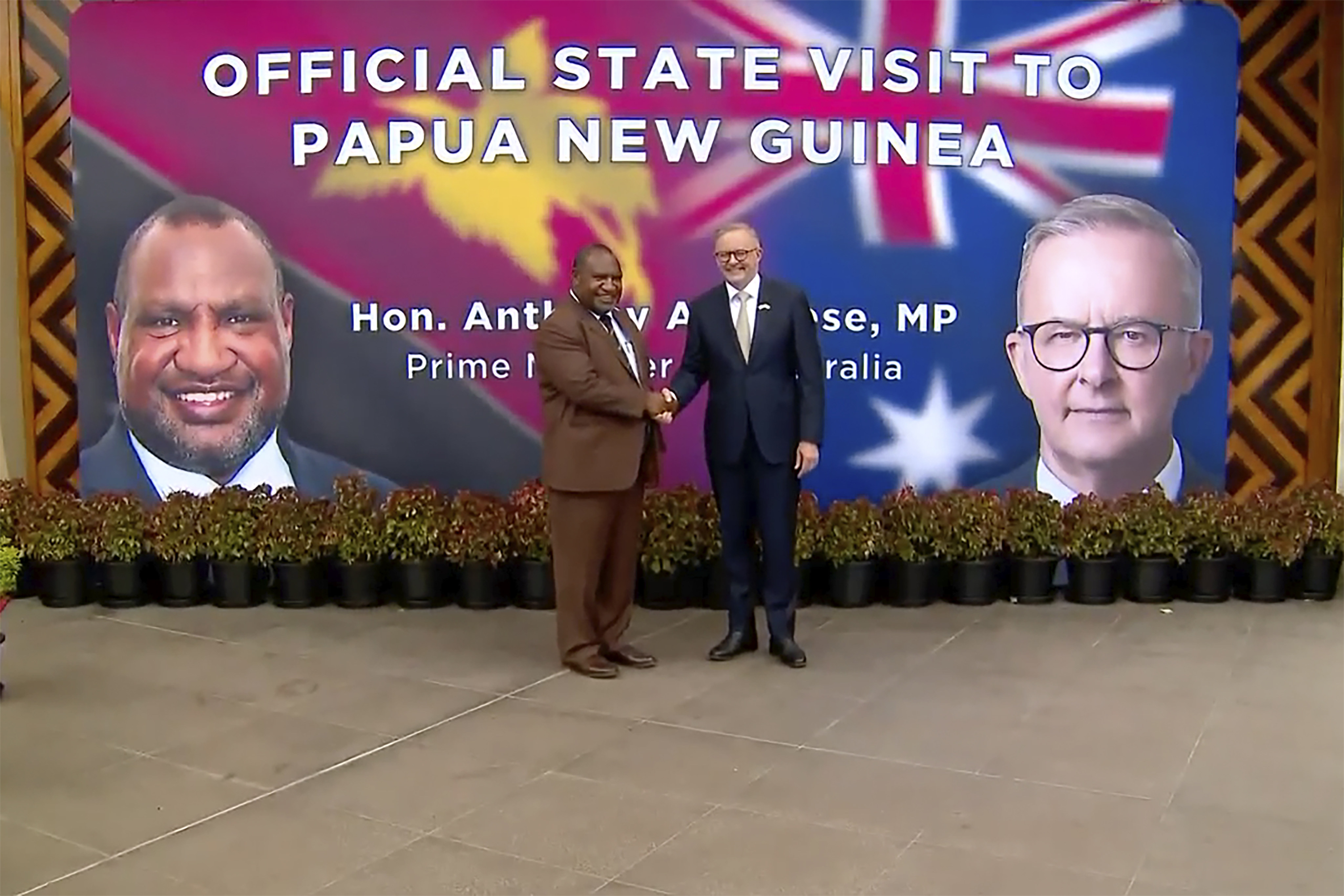 Australian Prime Minister Anthony Albanese, left, and Papua New Guinea’s Prime Minister James Marape shake hands outside the parliament in Port Moresby, Papua New Guinea on January 12, 2023. Photo: via AP