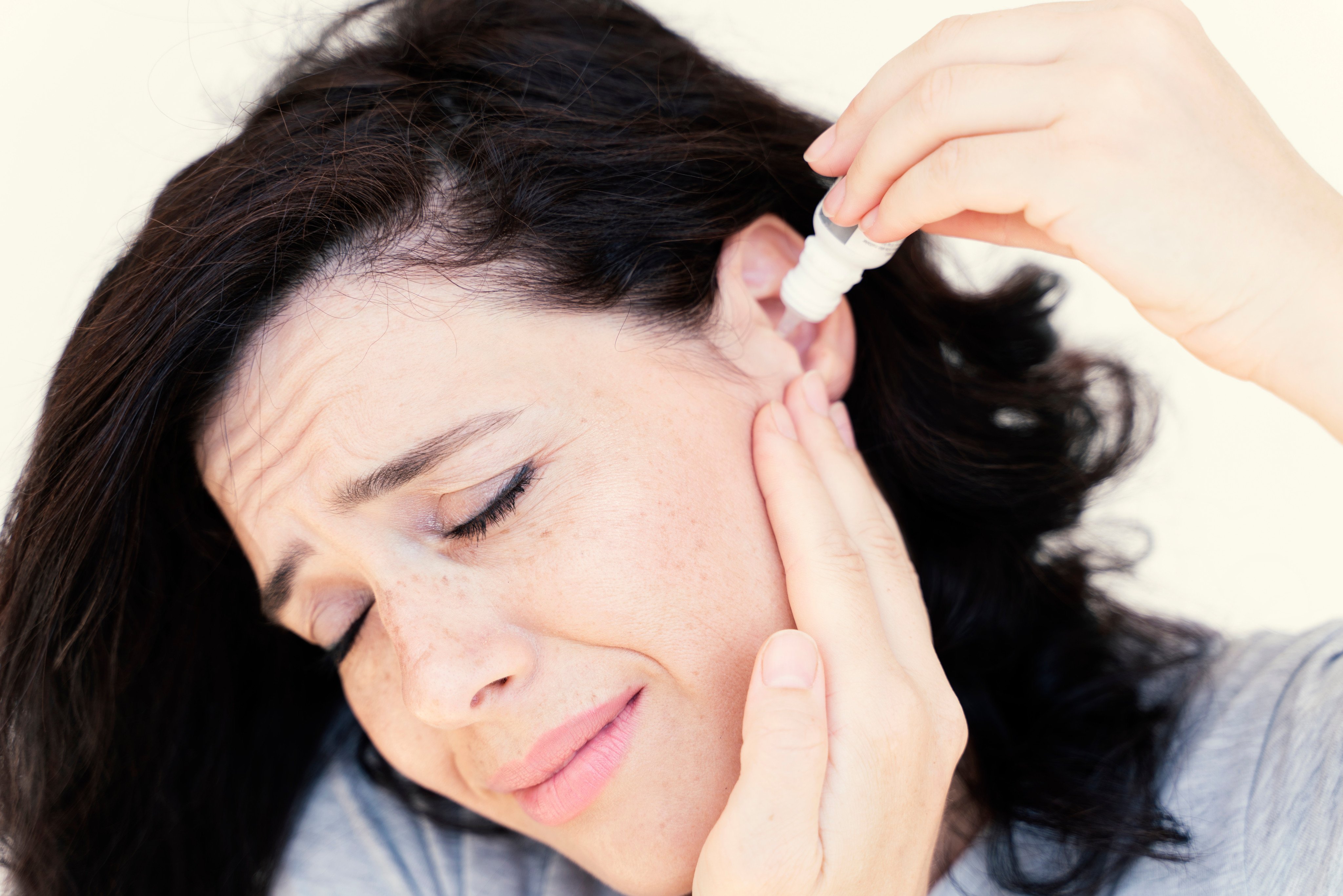 Ear oiling - adding drops of essential oil such as tea tree oil - to the ear canal, then massaging the ear, is one of several remedies for earache in  Ayurveda, or traditional Indian medicine. Photo: Shutterstock