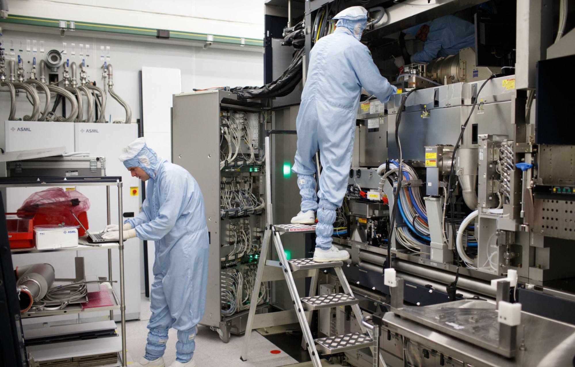 Employees work at an ASML Holding NV factory in Veldhoven, Netherlands. ASML is Europe’s largest supplier of semiconductor production equipment. Photo: Bloomberg