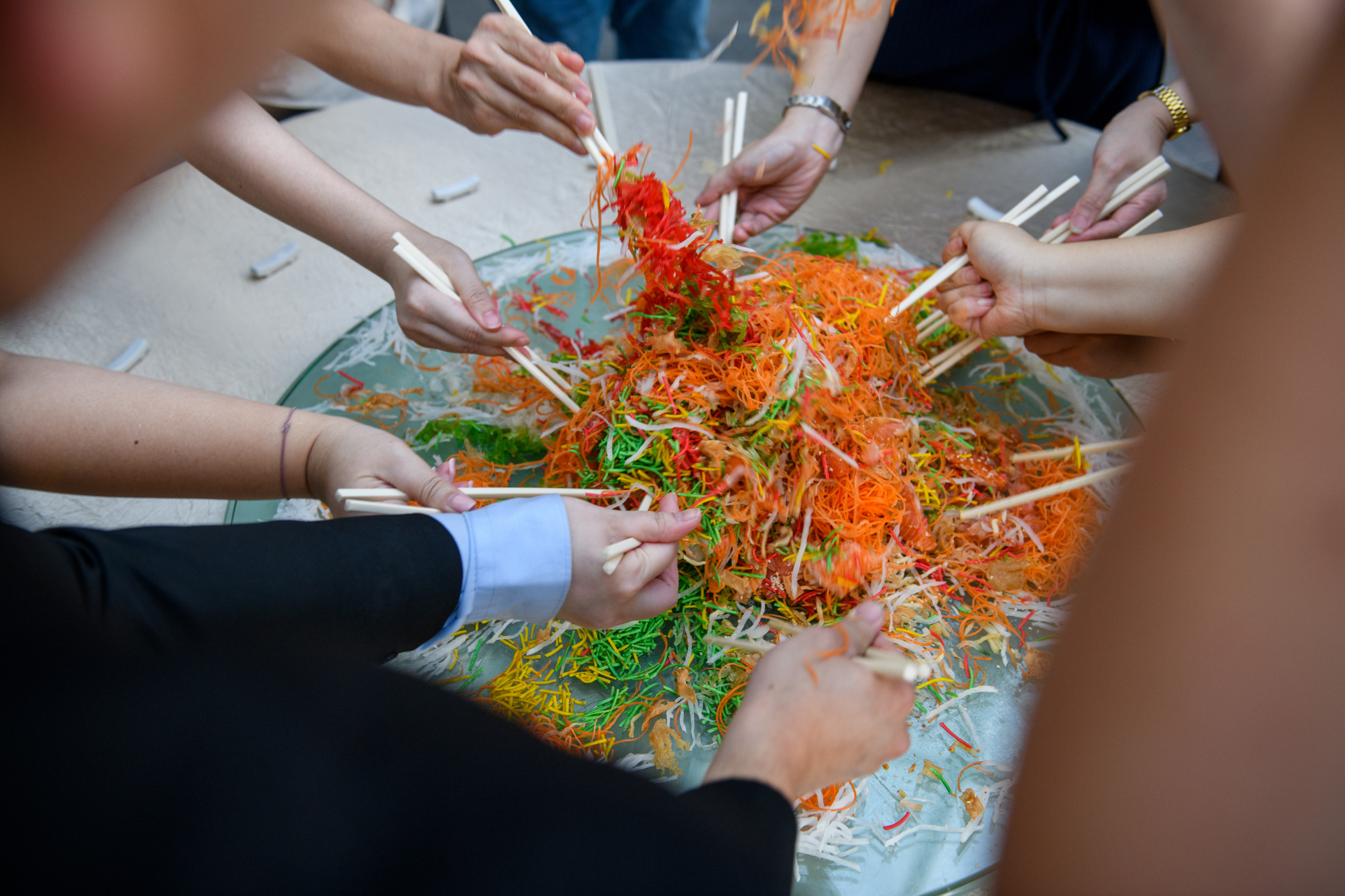 By tradition, Chinese in Singapore and Malaysia toss a raw fish and vegetable salad (above) while shouting wishes for wealth at Lunar New Year. It’s not something other Chinese communities practise, but that doesn’t make it inferior, Wee Kek Koon writes. Photo: Getty Images
