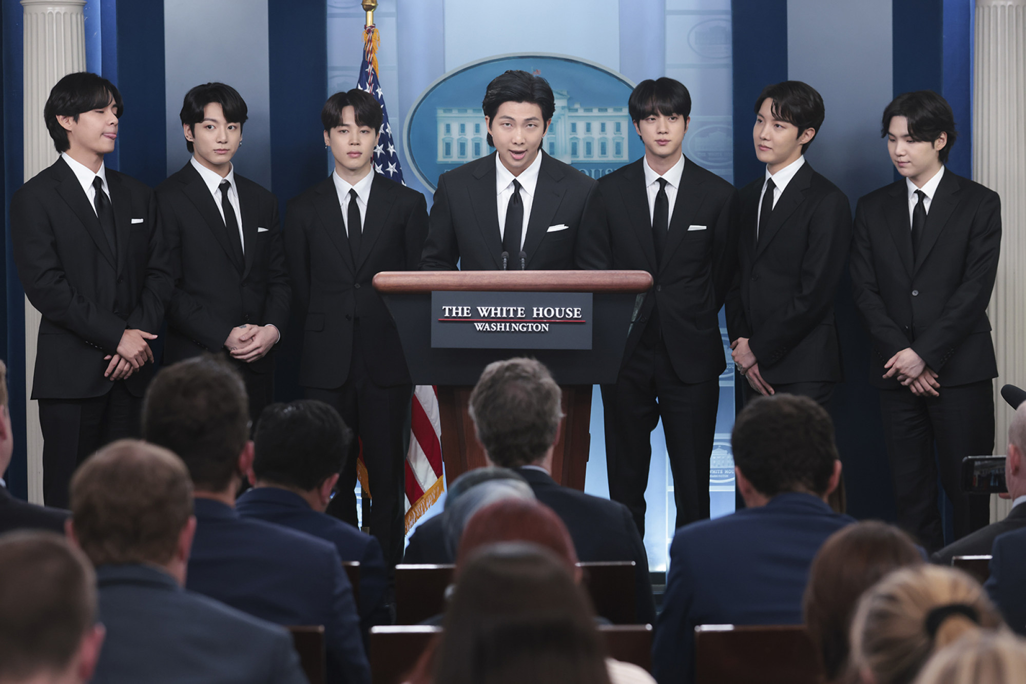 Members of the K-pop band BTS address a press briefing at the White House in Washington on May 31. Photo: TNS