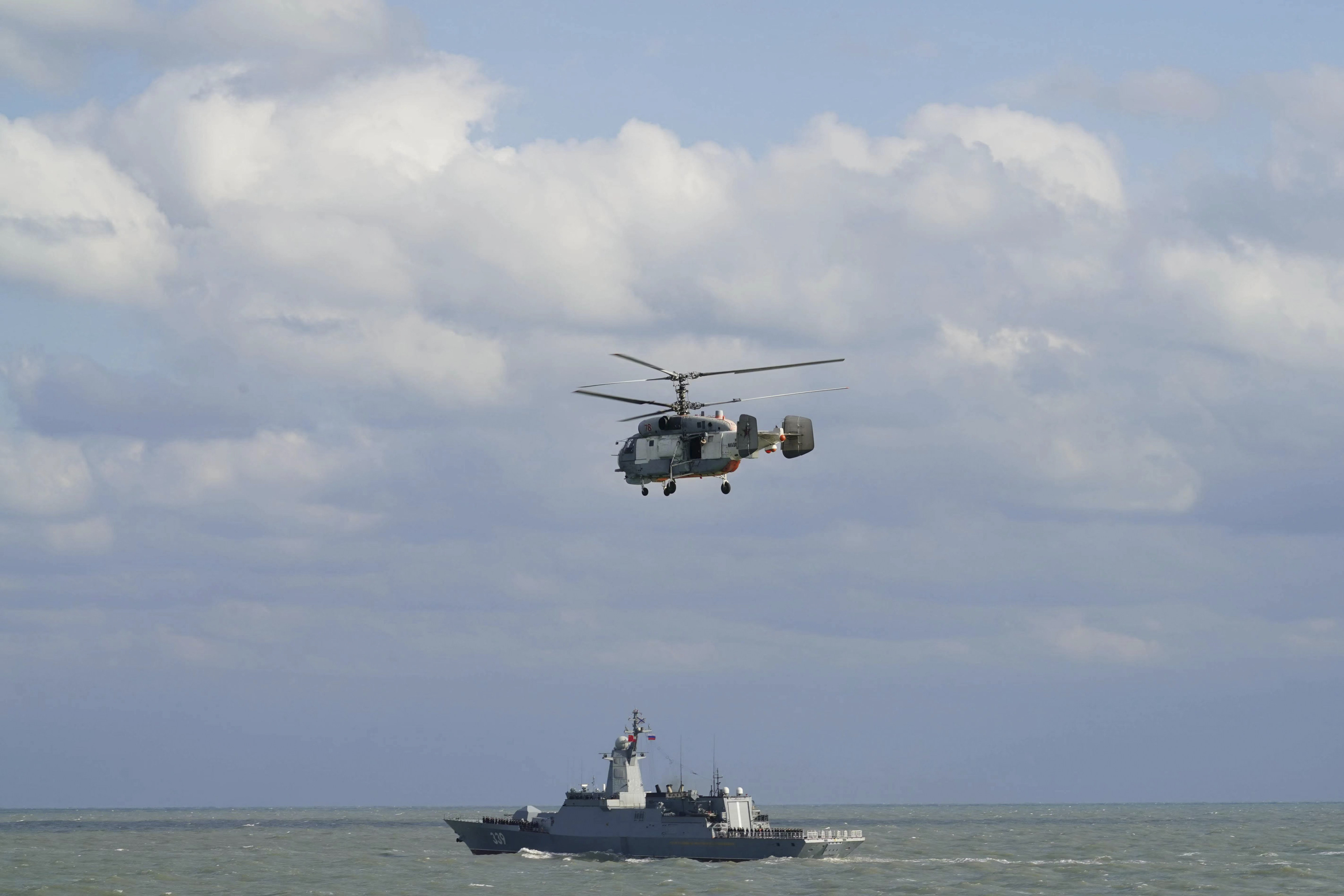 A Russian naval frigate and a helicopter take part in a joint naval drills with Chinese warships last month. Photo: Xinhua via AP