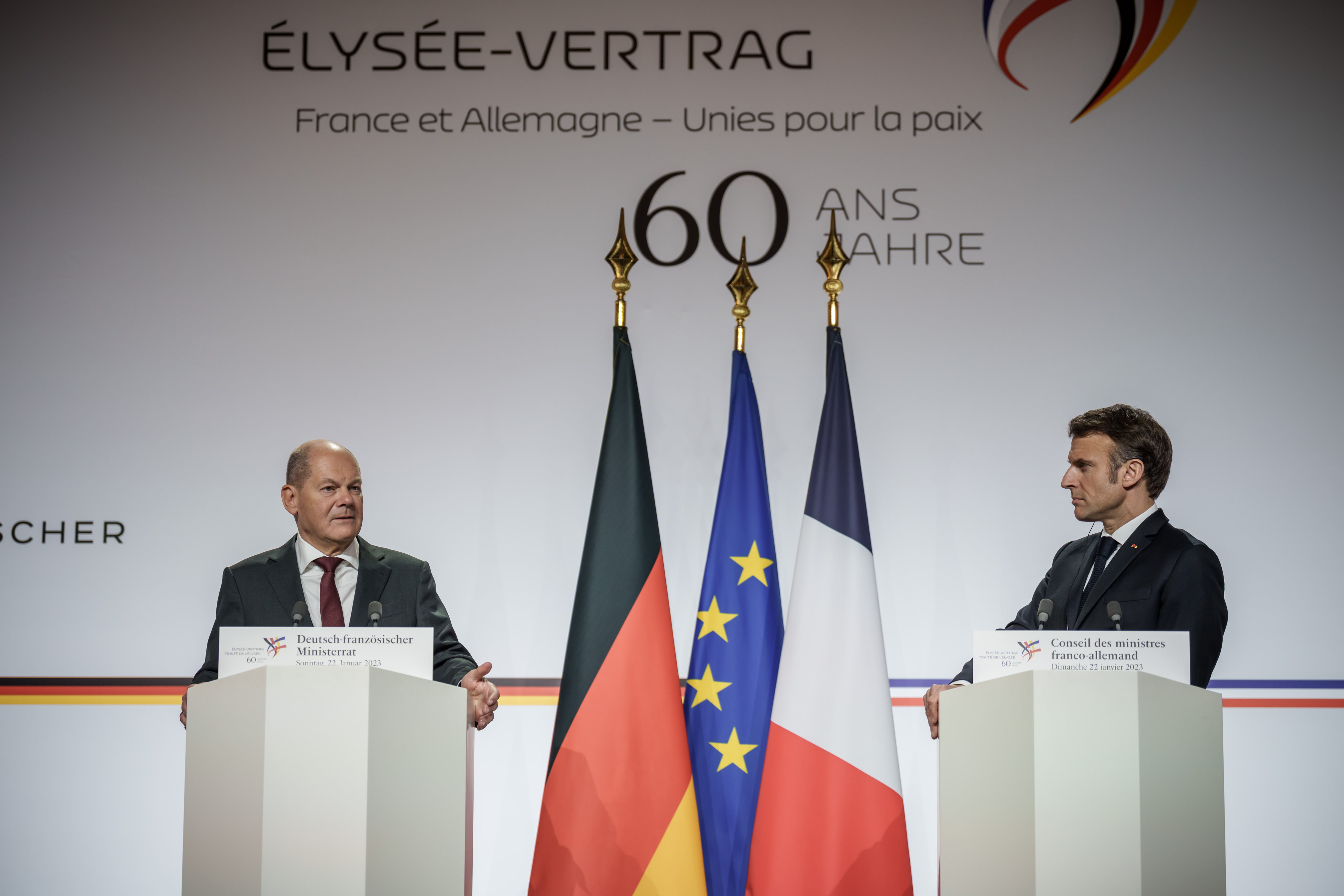 German Chancellor Olaf Scholz, left, and French President Emmanuel Macron at the Franco-German Council of Ministers to mark the 60th anniversary of the Elysee Treaty in Paris on Sunday. Photo: dpa