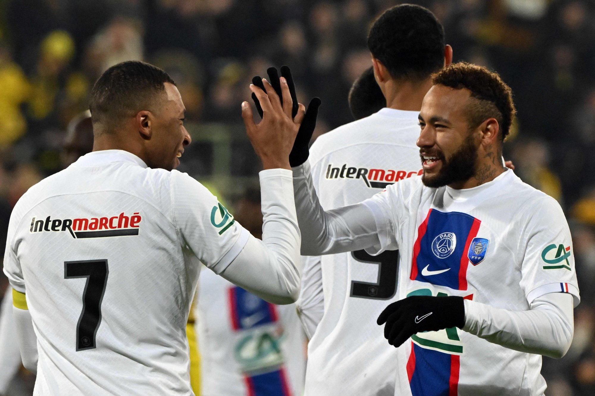 Kylian Mbappe celebrates with Paris Saint-Germain’s Brazilian forward Neymar after scoring. Photo: AFP