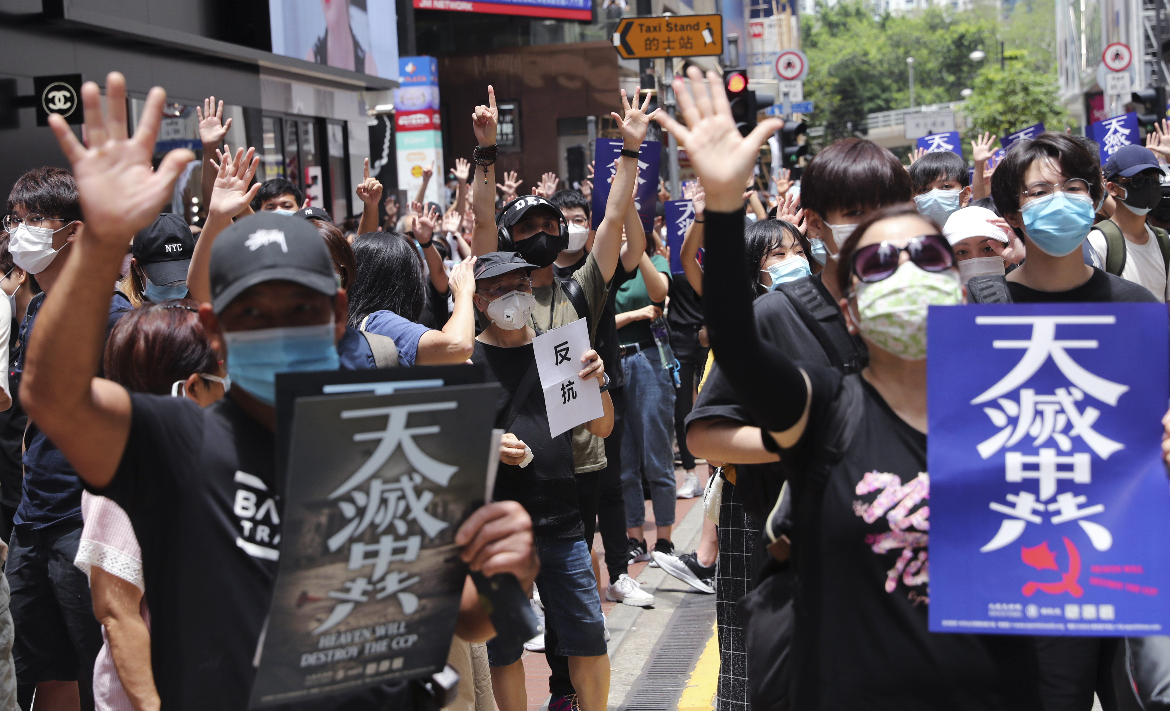 Protesters gather near Sogo department store in Causeway Bay for a march protesting against the government’s enactment of national security law on May 24, 2020. Photo: Sam Tsang 