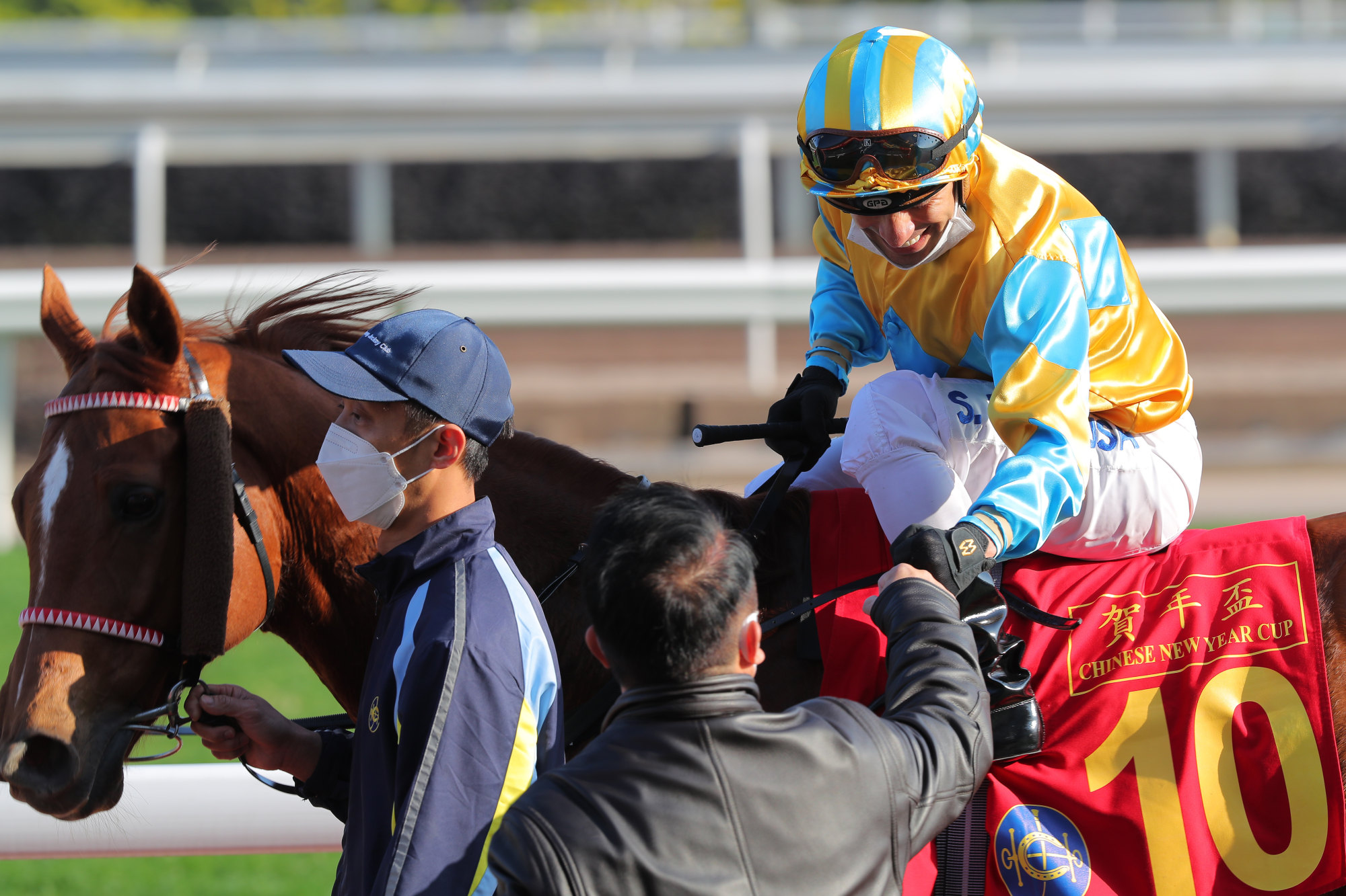 Trainer Ricky Yiu and jockey Silvestre de Sousa enjoy Mr Ascendency’s victory.