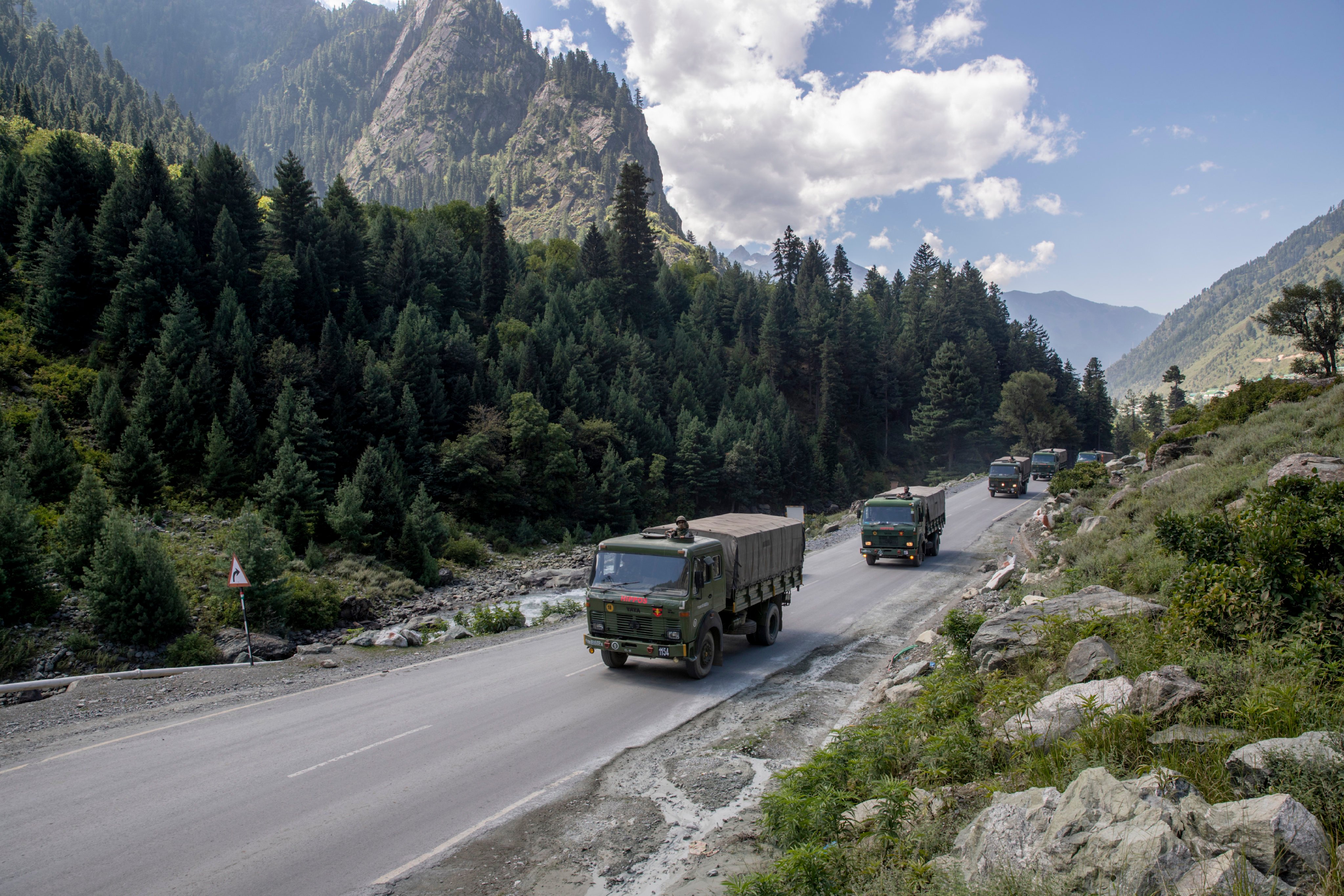 An Indian army convoy moves on the Srinagar- Ladakh highway at Gagangeer in Indian-controlled Kashmir. File photo: AP 