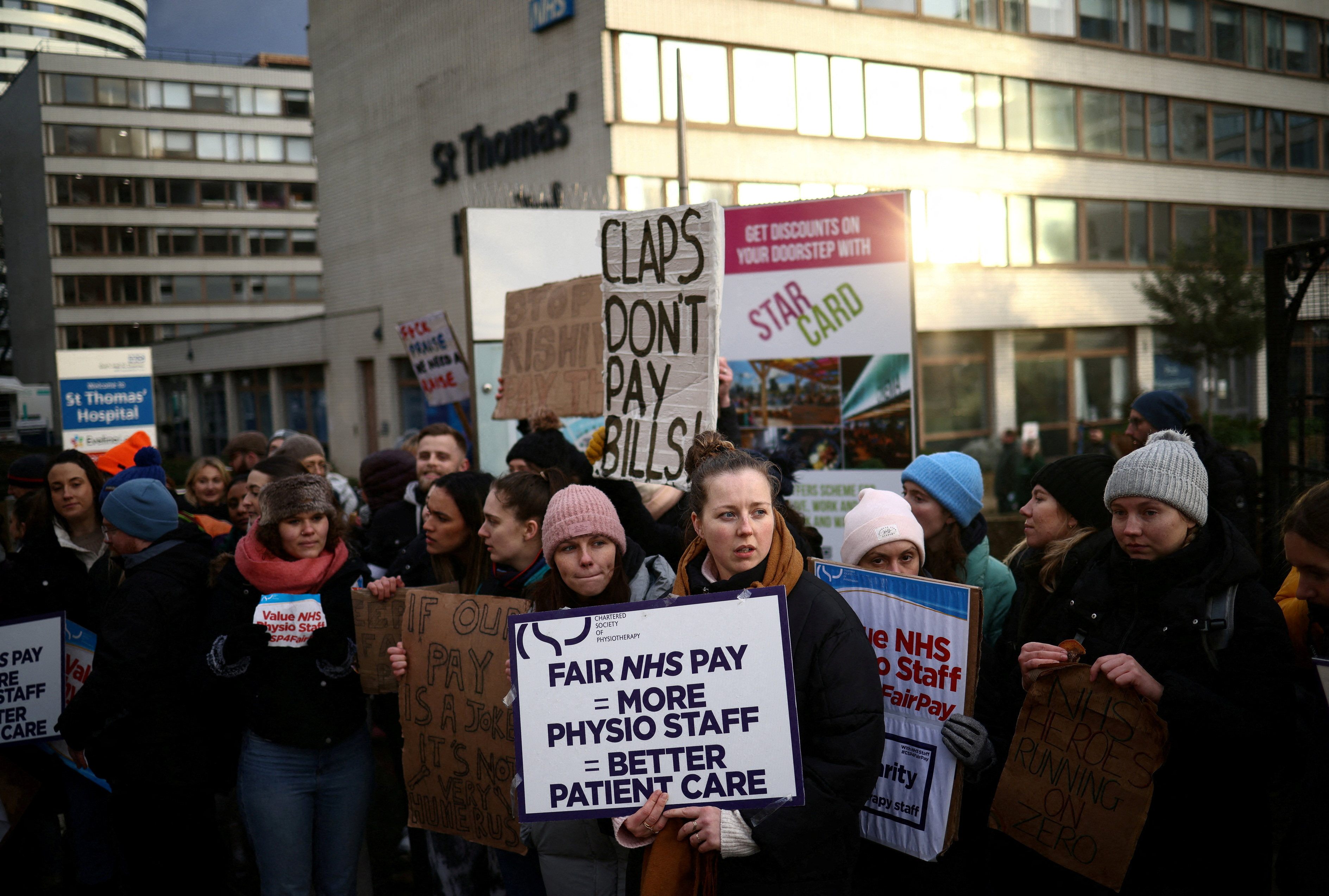 NHS physiotherapists striking outside St Thomas’ Hospital in London on Thursday. Photo: Reuters