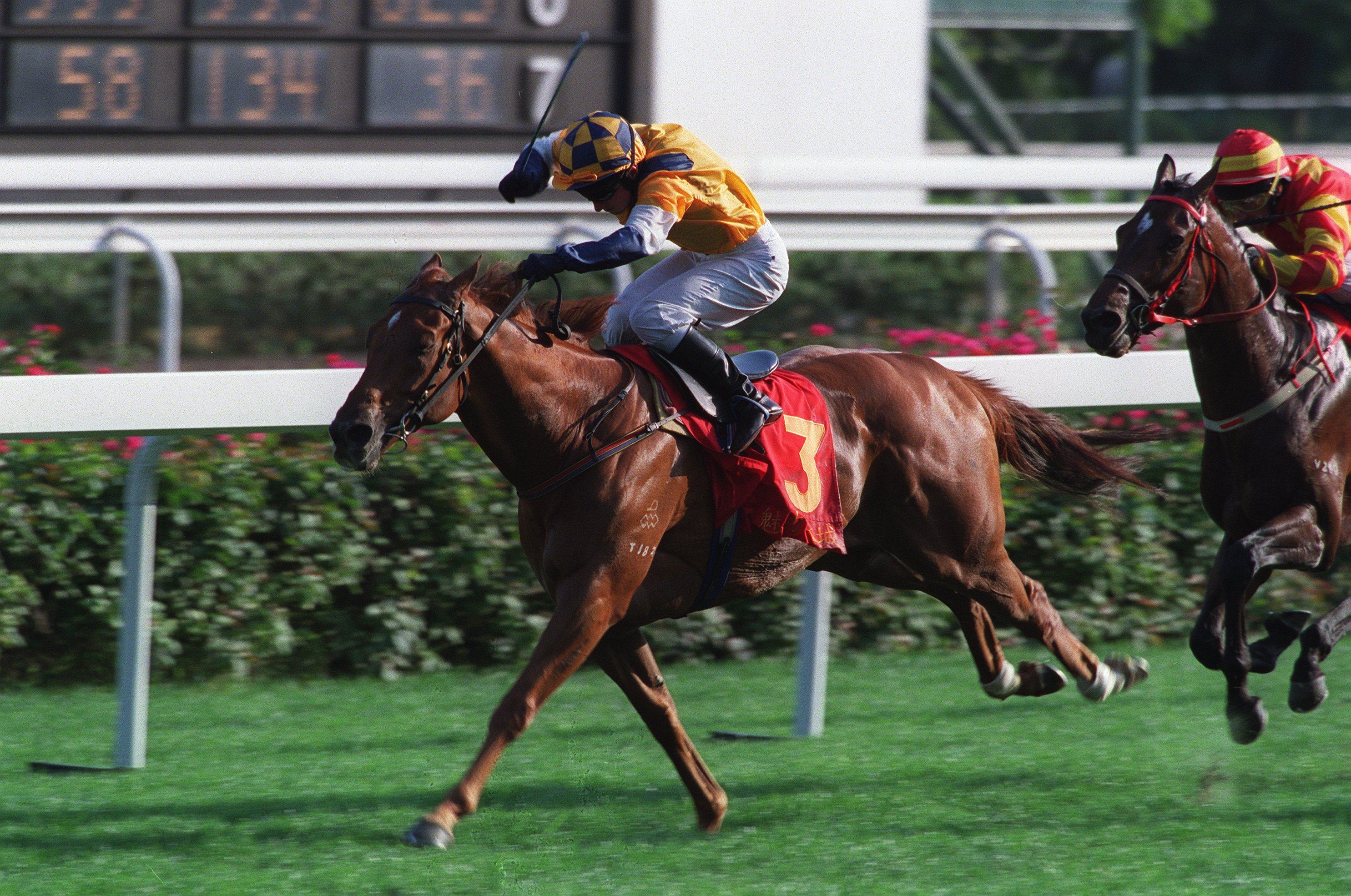 Charming City extends under Shane Dye to win the 2001 Classic Mile at Sha Tin. Photo: Oliver Tsang