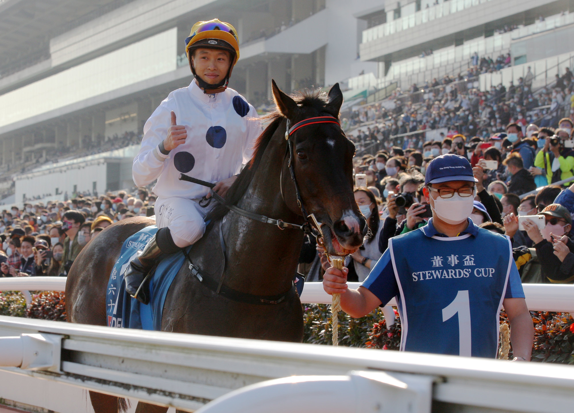 A victorious Vincent Ho and Golden Sixty.