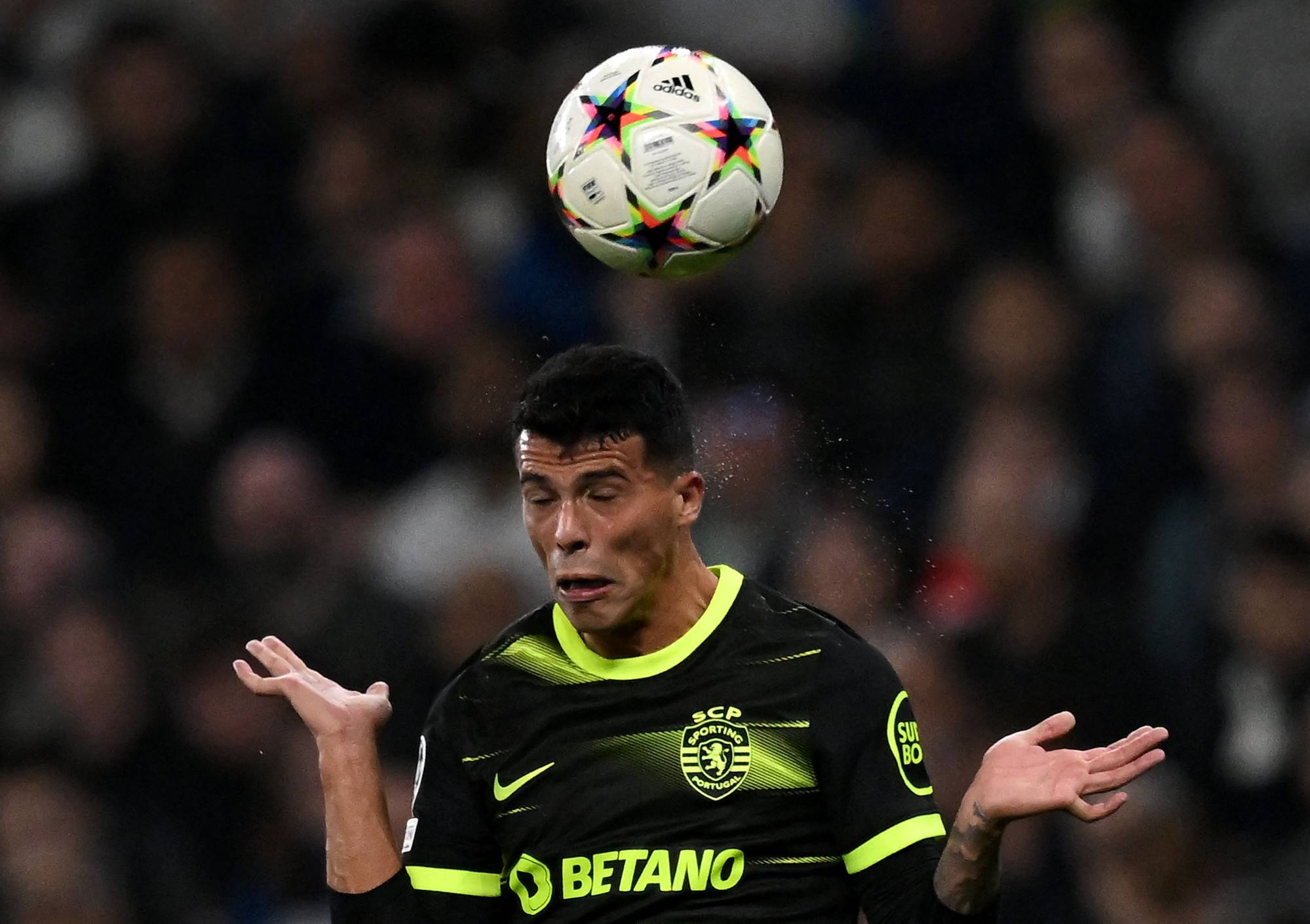 Sporting Lisbon’s Spanish defender Pedro Porro heads the ball during a Uefa Champions League match against Tottenham. Photo: AFP