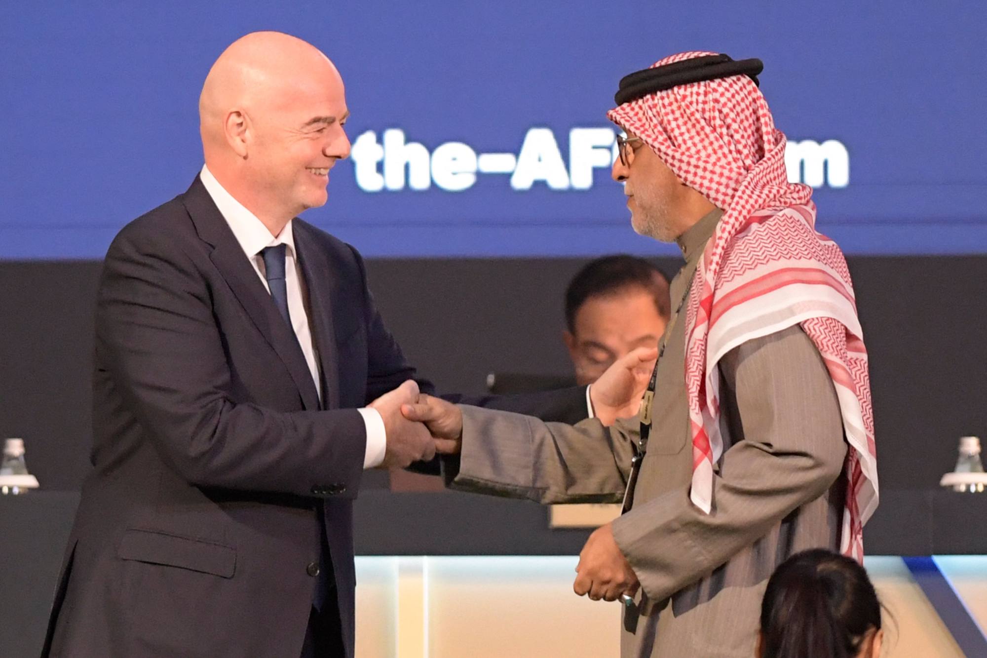 Fifa president Gianni Infantino (left) greets AFC President Salman bin Ibrahim al-Khalifa. Photo: AFP