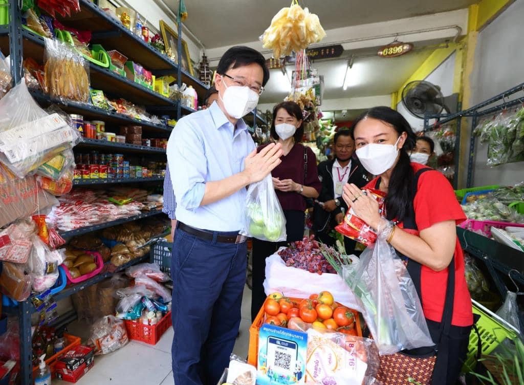 Chief Executive John Lee at a grocery store in Thailand during a trip in November last year. Photo: Handout