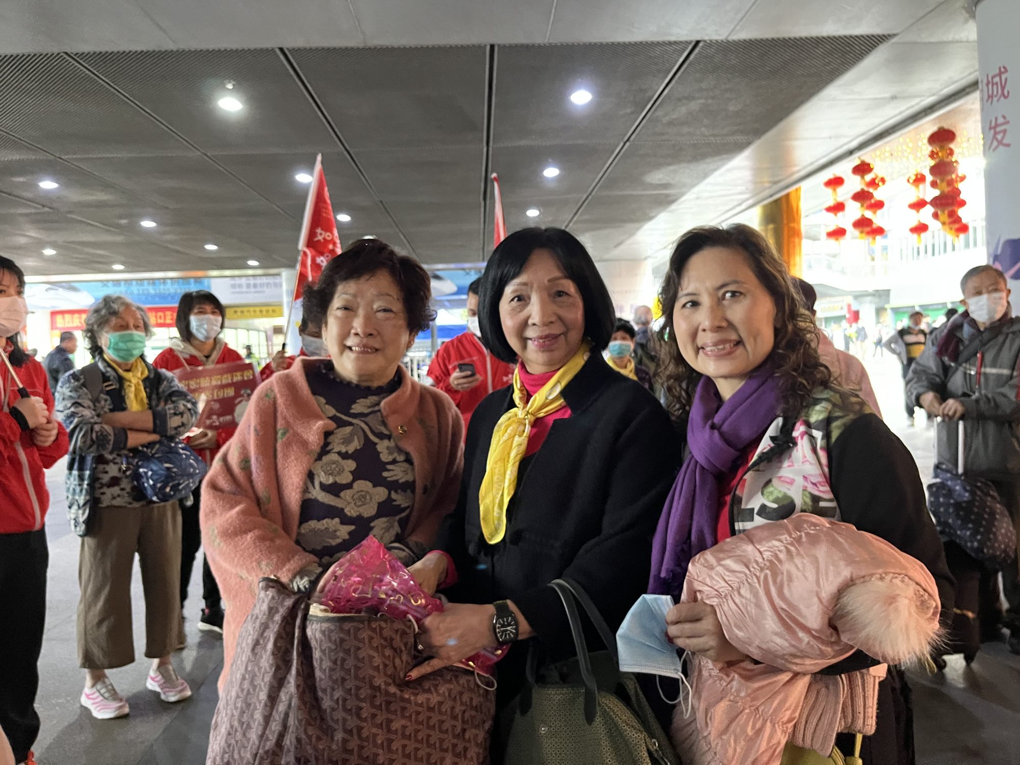 Ng Fung-ying (centre) has organised a three-day tour for 20 people to watch a performance in Dongguan. Photo: Emily Hung