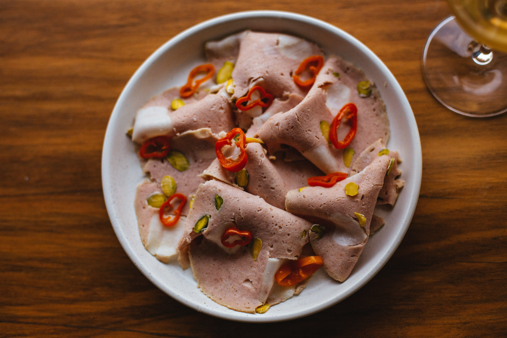 Travis Hayden from Voodoo Vin takes eight hours to make his mortadella (above). Photo: TNS