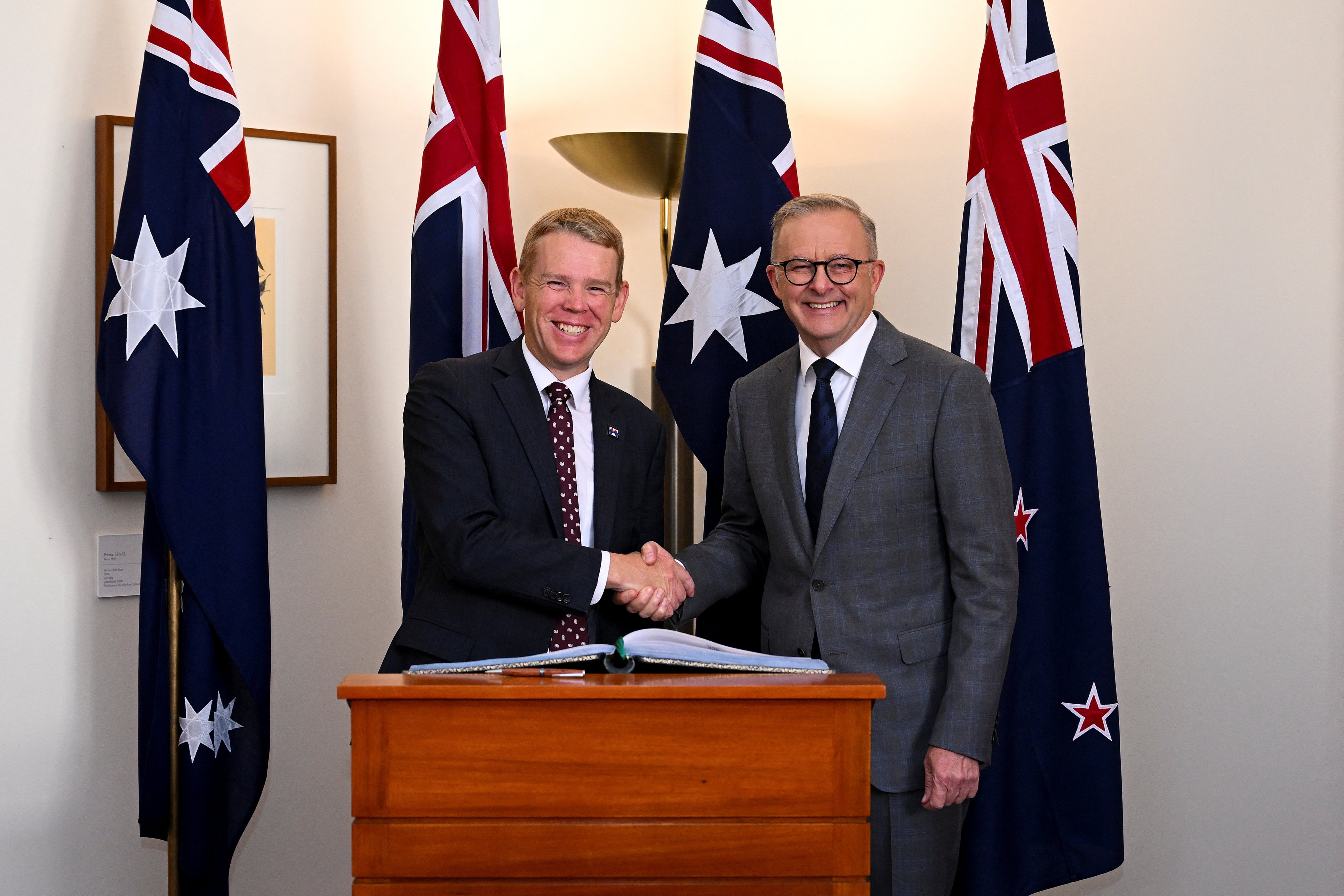 New Zealand Prime Minister Chris Hipkins shakes hands with Australian Prime Minister Anthony Albanese at Parliament House in Canberra on Tuesday. Photo: AAP Image via Reuters 