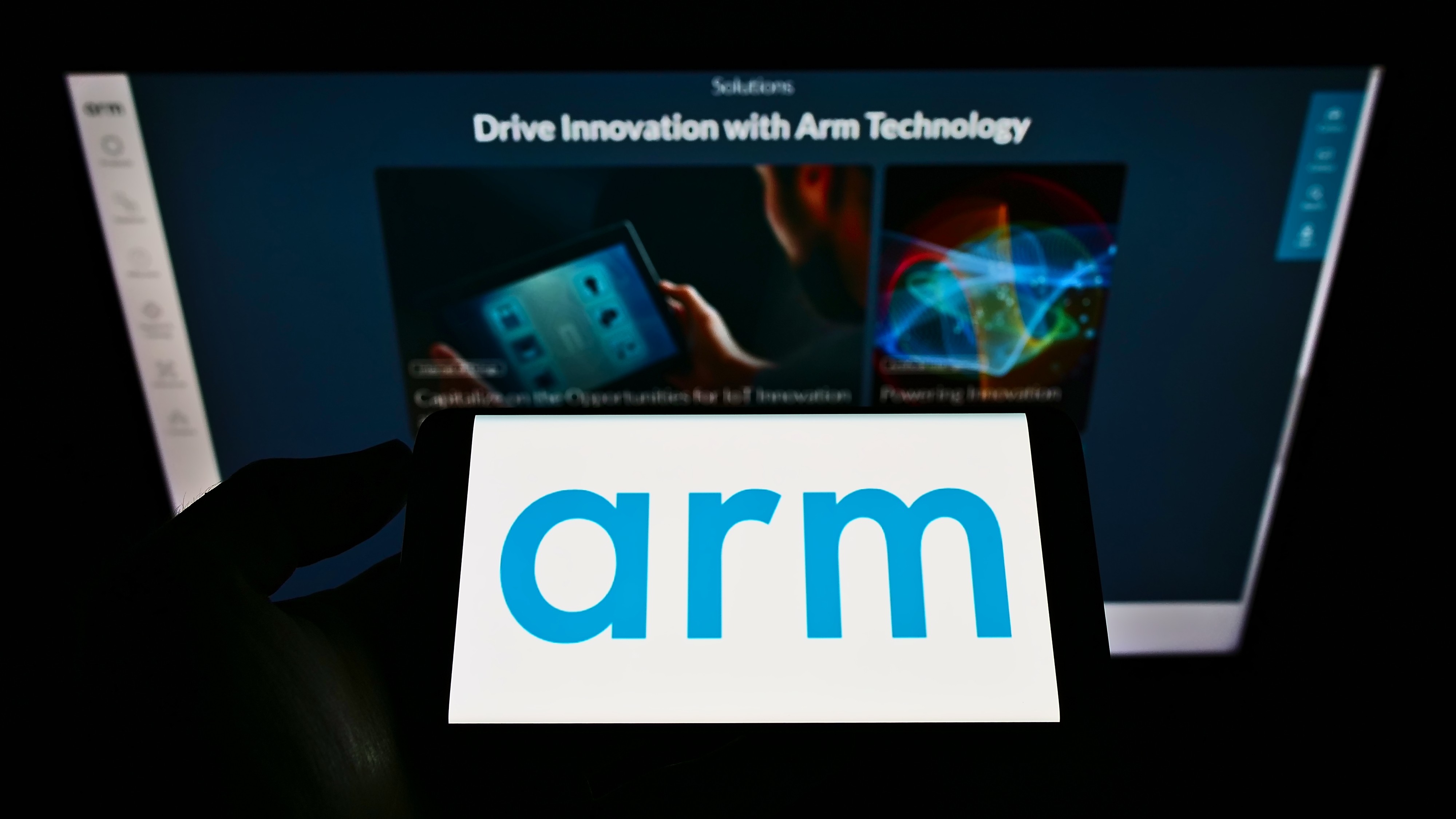 A smartphone screen shows the logo of British semiconductor technology company Arm. Photo: Shutterstock