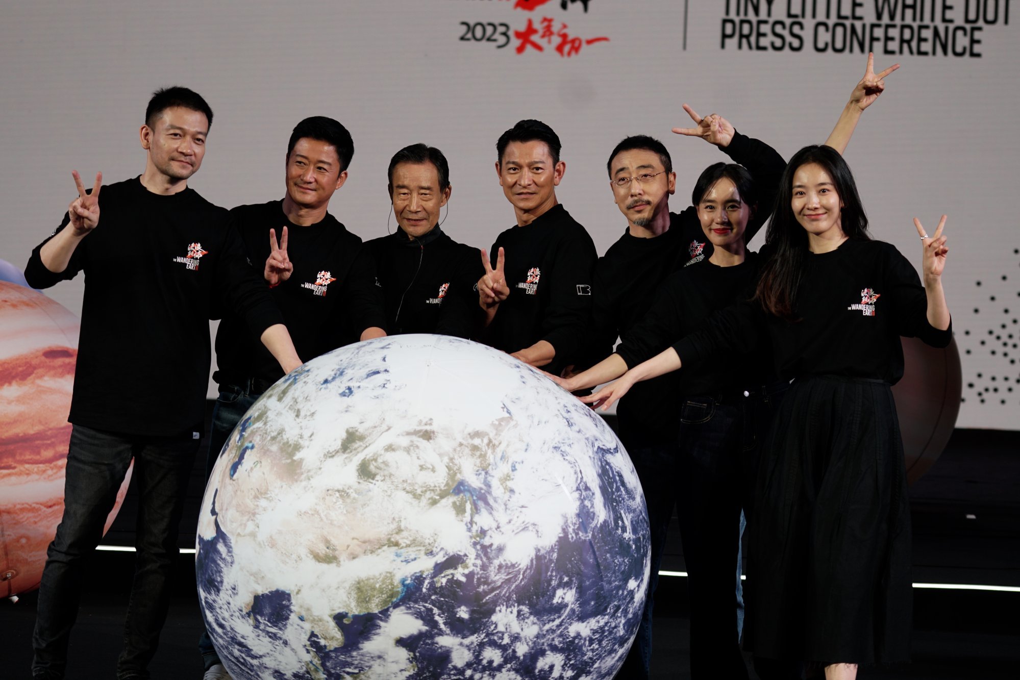 Director Frant Gwo (far left), actors Wu Jing (second from left) and Andy Lau (centre) at a promotional event for The Wandering Earth II.