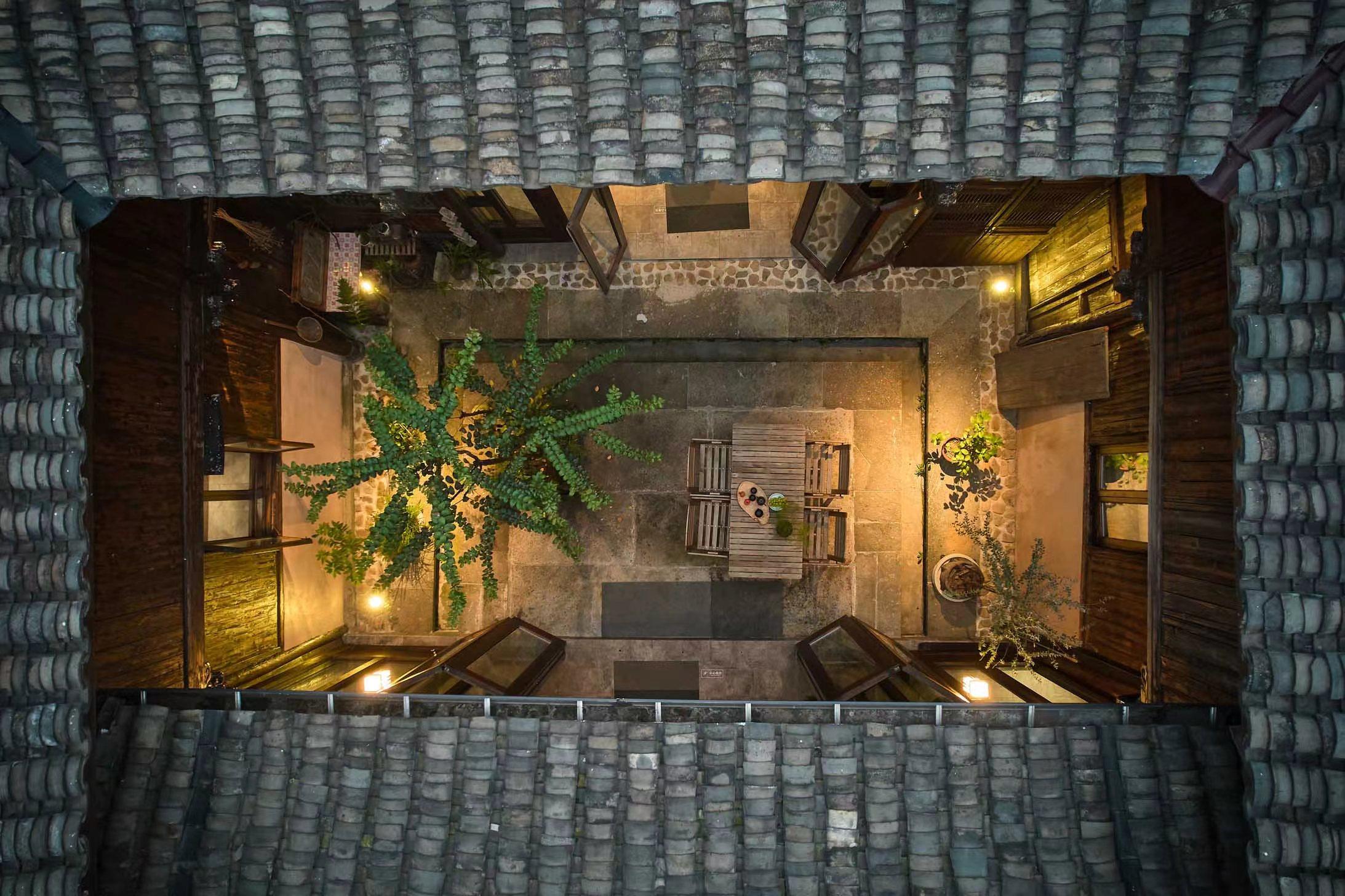 An overhead view of the courtyard at the heart of the Eight Blessings Inn in Hangzhou, China, a bed and breakfast converted from an 18th century house by a Hong Kong-based interior designer and her aunt. Photo: Courtesy of JoAnn Leung