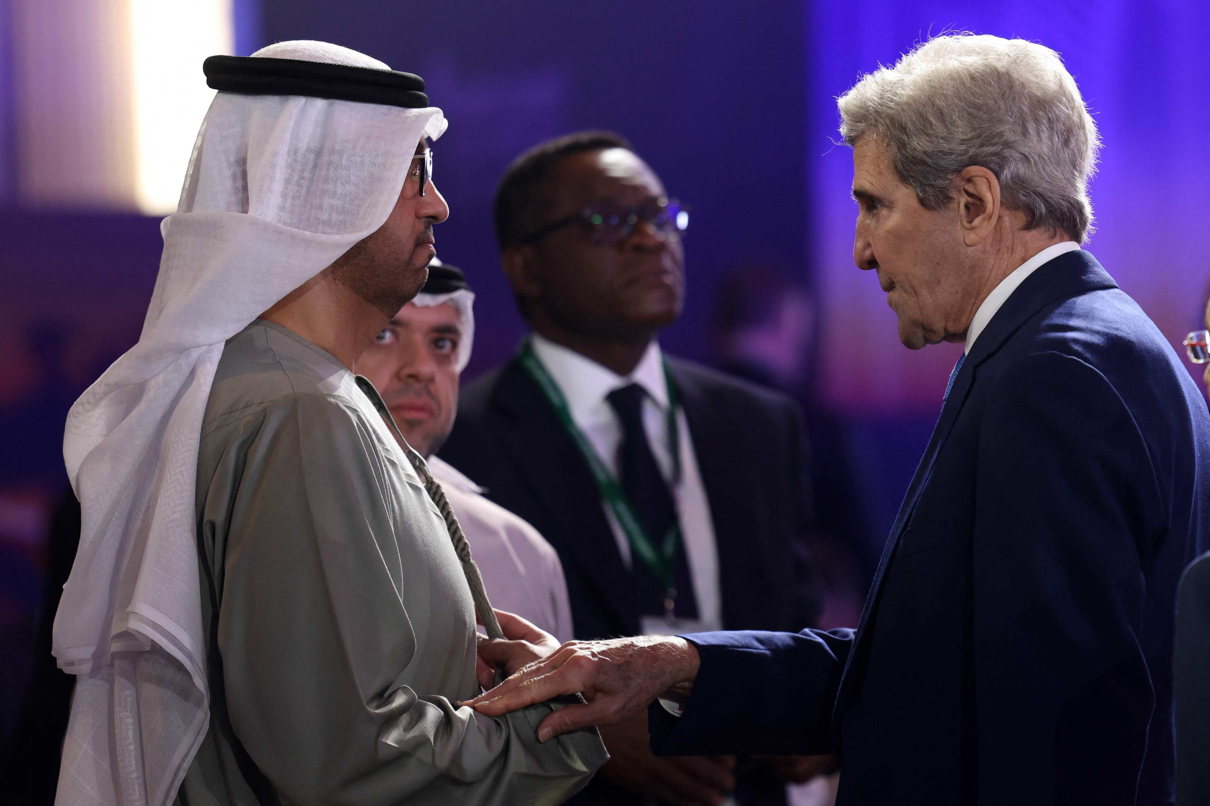The UAE Minister of State and CEO of the Abu Dhabi National Oil Company, Sultan Ahmed al-Jaber, speaks to the US Presidential Envoy for Climate John Kerry, at the opening session of the Atlantic Council Global Energy Forum, in Abu Dhabi on January 14. Al-Jaber is president of this year’s COP28 climate talks. Photo: AFP