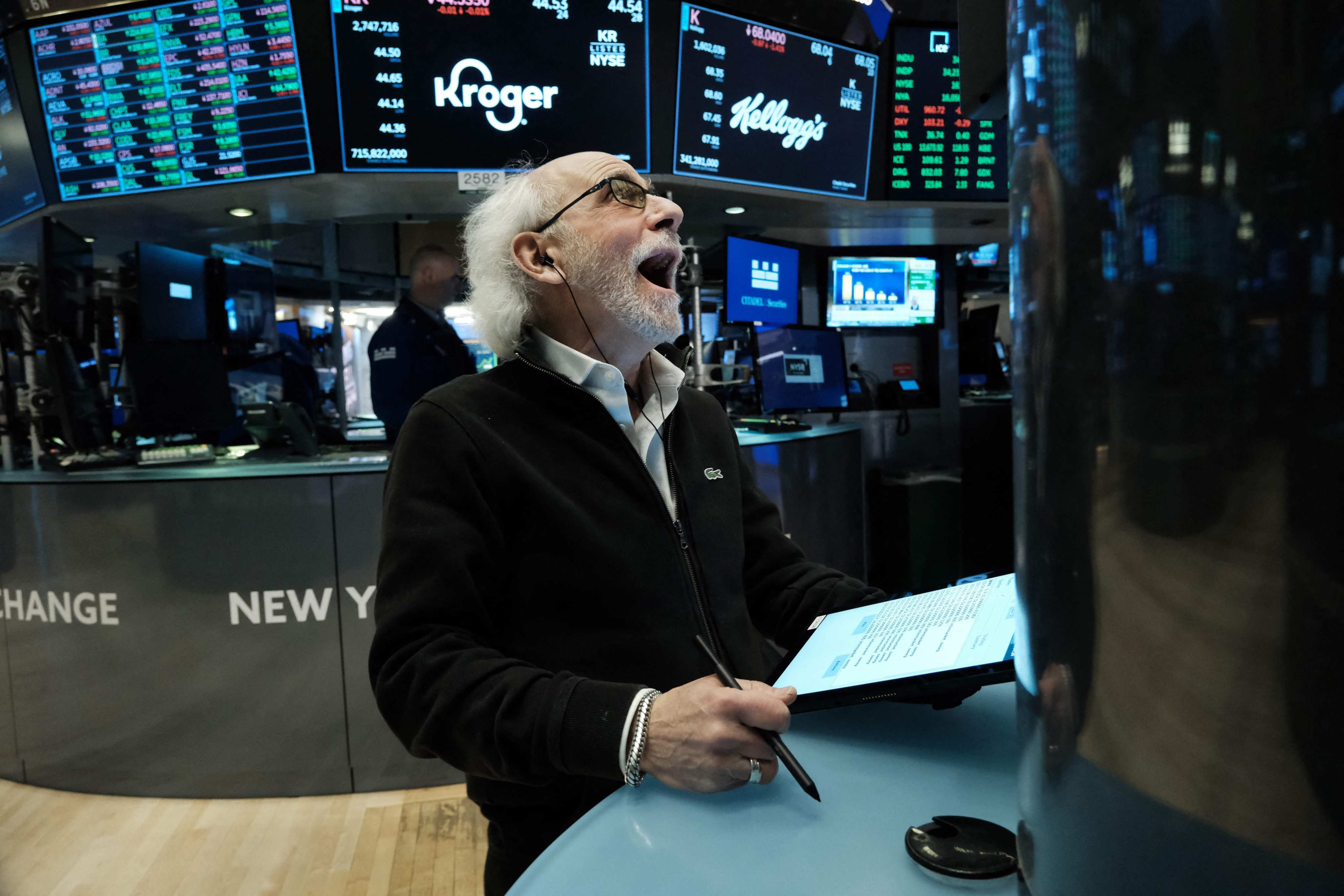 A trader works on the floor of the New York Stock Exchange on February 7. Stock markets’ increasing disconnect from world events should alert investors to their frequent inability to distinguish fantasy from reality. Photo: AFP